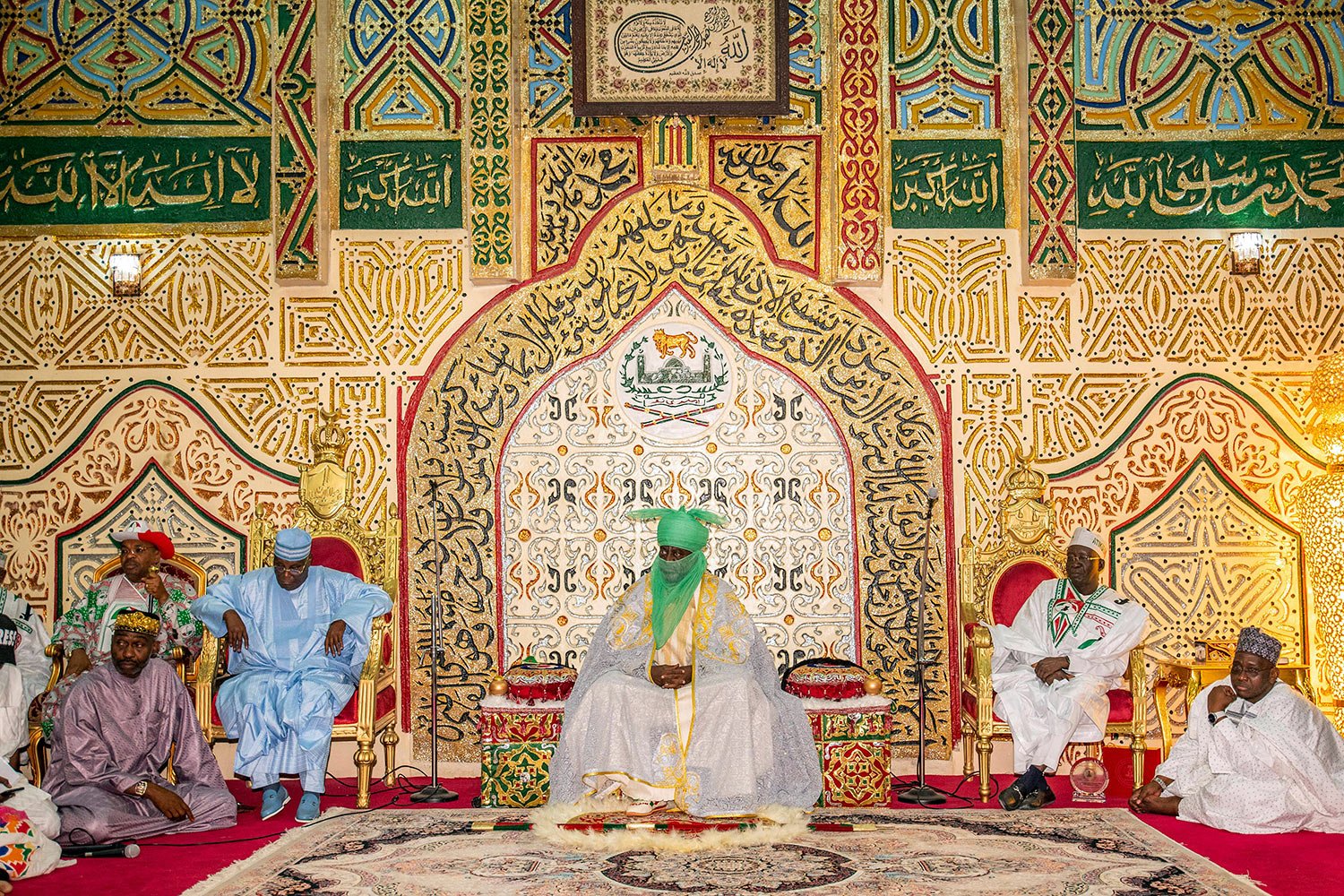  Atiku Abubakar, presidential candidate of the People's Democratic party, left, visits the Emir of Kano Aminu Ado Bayero, center, at his palace before an election campaign in Kano, Nigeria Thursday, Feb. 9, 2023. (AP Photo/Sani Maikatanga) 