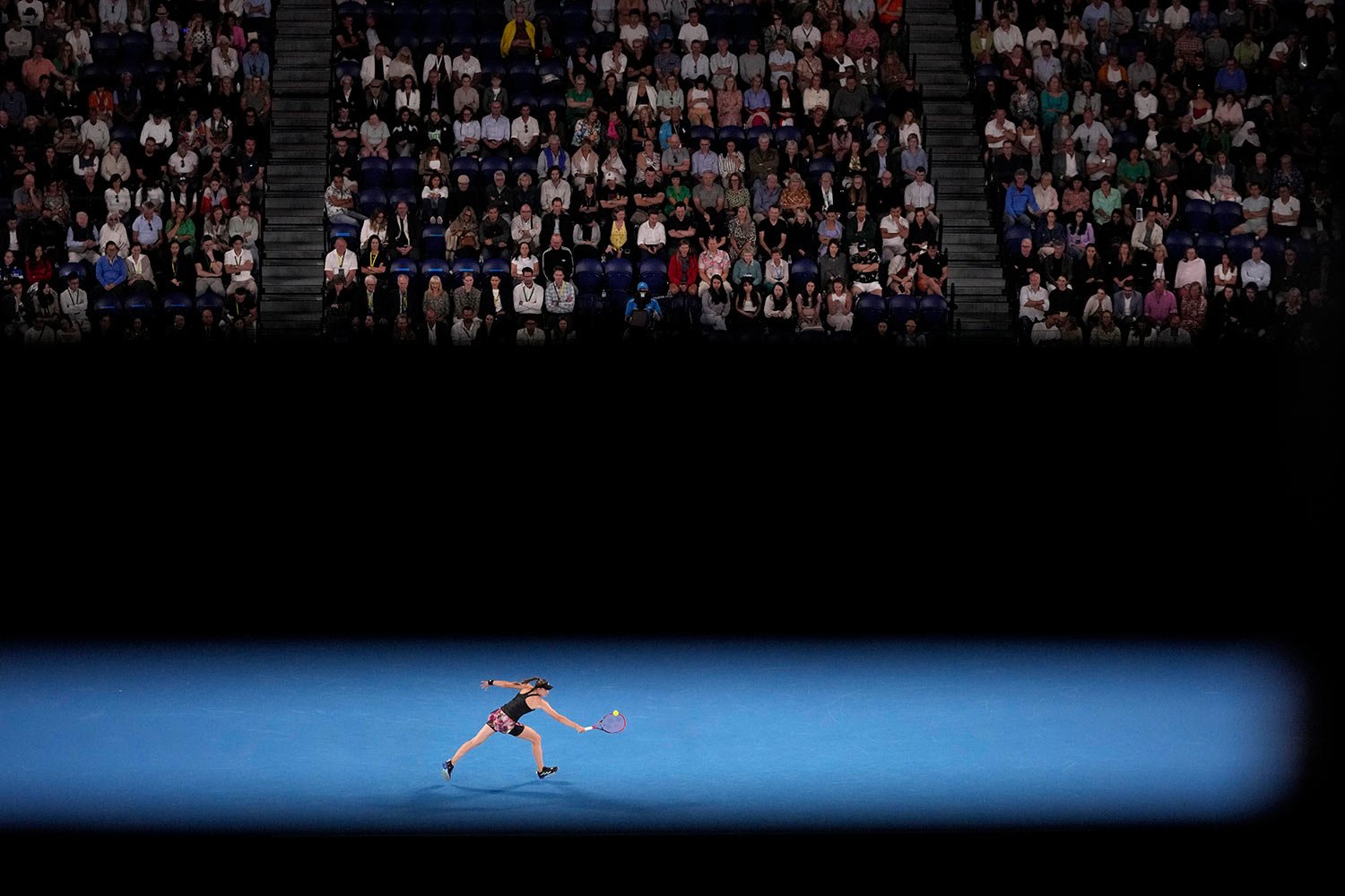  Elena Rybakina of Kazakhstan plays a backhand return to Victoria Azarenka of Belarus during their semifinal match at the Australian Open tennis championship in Melbourne, Australia, Thursday, Jan. 26, 2023. (AP Photo/Dita Alangkara) 