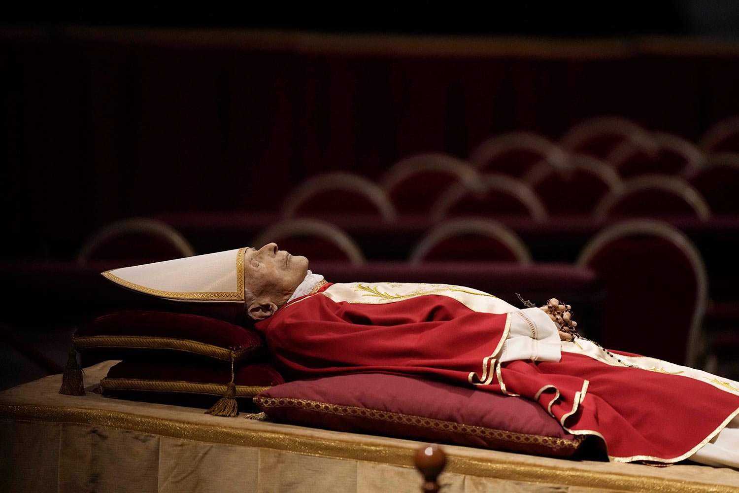  The body of late Pope Emeritus Benedict XVI laid out in state inside St. Peter's Basilica at The Vatican, Monday, Jan. 2, 2023. (AP Photo/Andrew Medichini) 