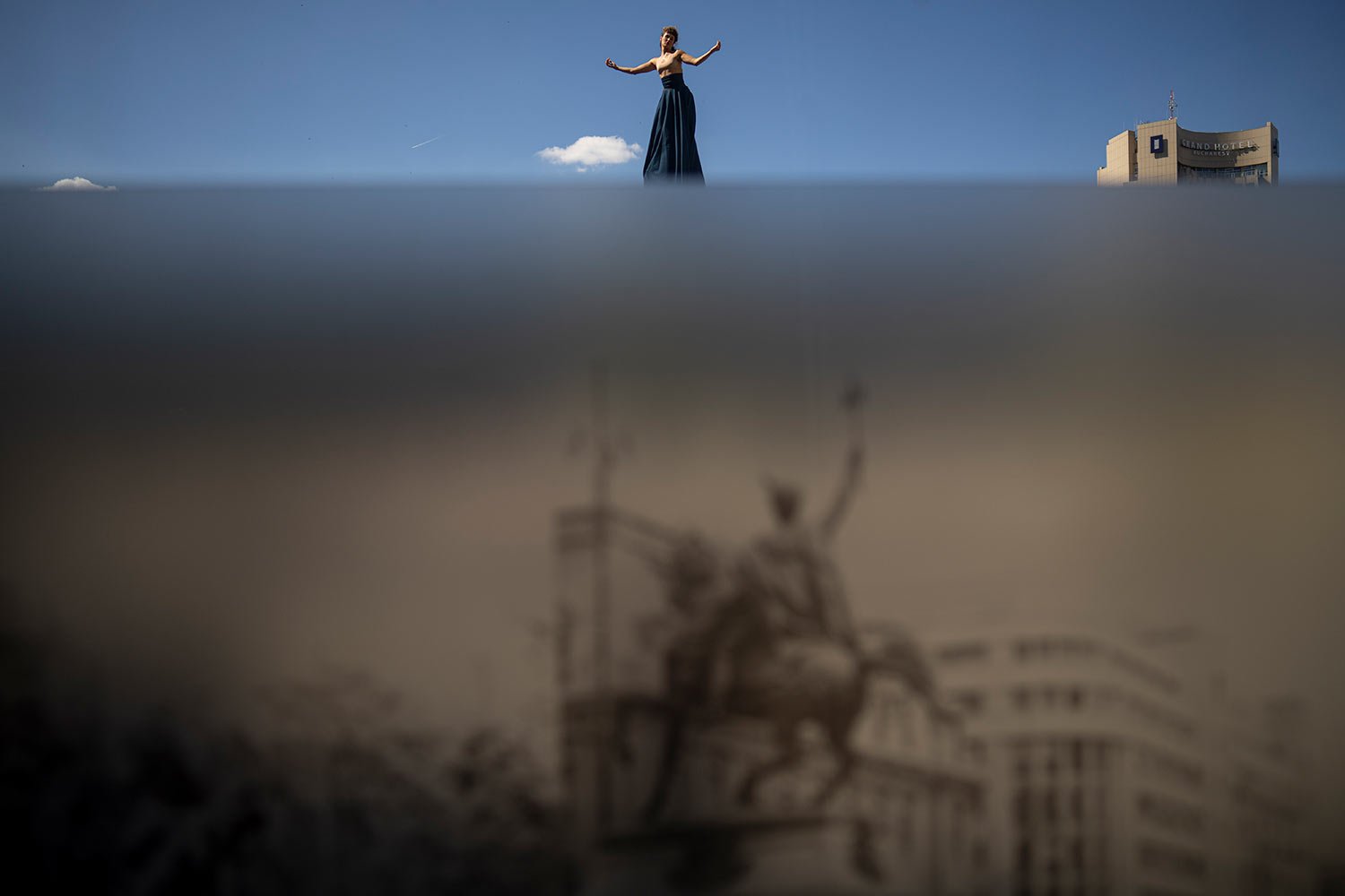  An artist of the French RoZeo theater company performs during the B-FIT in the Street international festival in Bucharest, Romania, Friday, June 30, 2023. (AP Photo/Vadim Ghirda) 