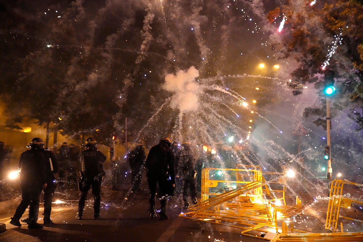  Police forces clash with youths in Nanterre, outside Paris, Thursday, June 29, 2023.  (AP Photo/Christophe Ena) 