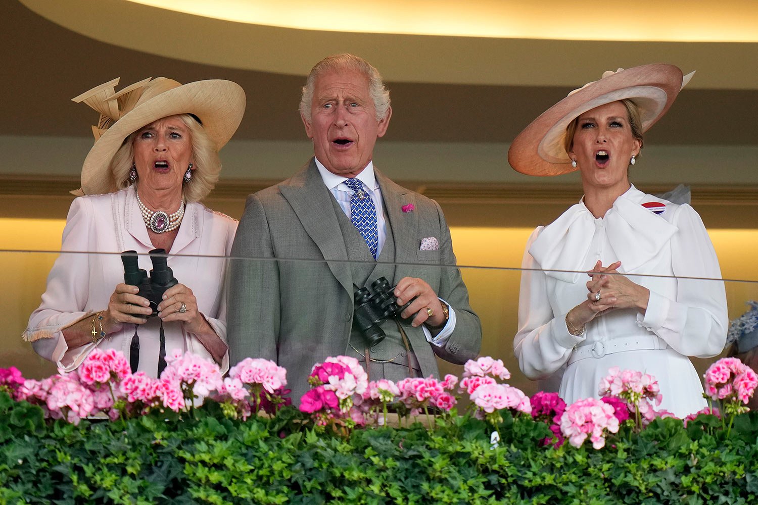  Britain's King Charles III, Camilla, the Queen Consort and Sophie, Duchess of Edinburgh, right, react as they watch a race at day two of the Royal Ascot horse racing meeting, at Ascot Racecourse in Ascot, England, Wednesday, June 21, 2023. (AP Photo