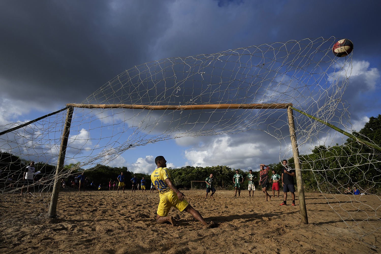  Athletes compete in a soccer match as part of the Indigenous Games, in the Tapirema community of Peruibe, Brazil, April 22, 2023. (AP Photo/Andre Penner) 