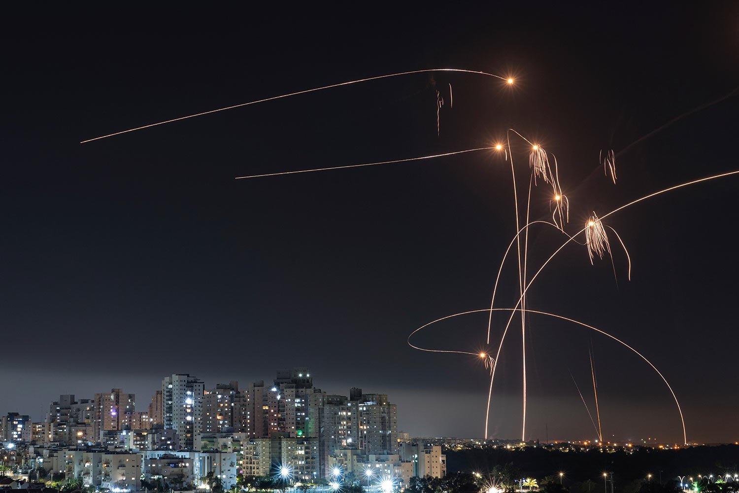  Israel's Iron Dome missile defense system fires interceptors at rockets launched from the Gaza Strip, in Ashkelon, southern Israel. Thursday, May 11, 2023. (AP Photo/Tsafrir Abayov) 