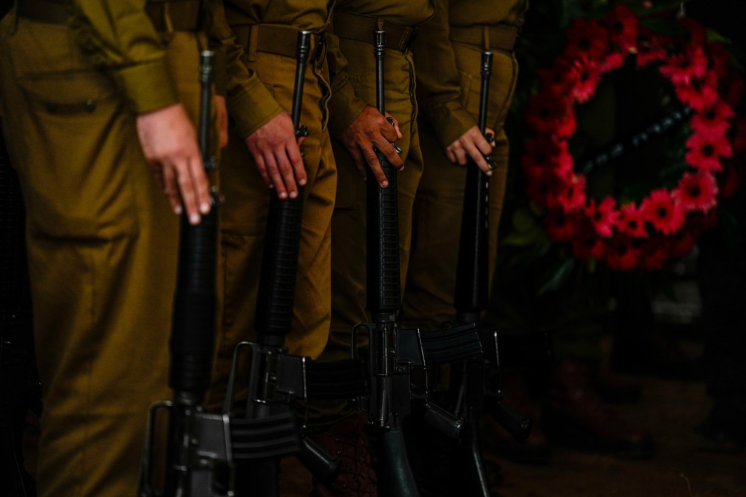  Israeli honor guard soldiers attend the funeral of Israeli reserve soldier Master sergeant Raz Abulafia during his funeral in the village of Rishpon, Israel, Tuesday, Nov. 14, 2023. Abulafia, 27, was killed during a military ground operation in the 