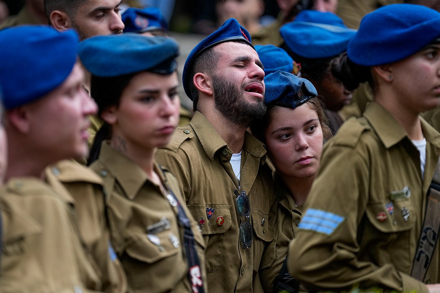  Israeli soldiers mourn during the funeral of Israeli soldier Corporal Avraham Fetena in Haifa, northern Israel, Friday, Nov. 17, 2023. Fetena, 20, was killed and six people were wounded in a shooting attack by three Palestinians at the checkpoint — 