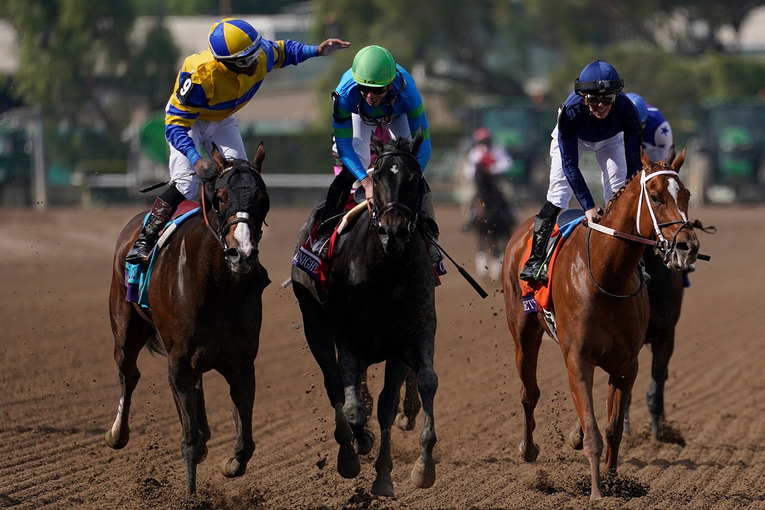  Irad Ortiz Jr., riding Goodnight Olive, center, gets a pat on the back from Ricardo Santana Jr., left, aboard Yuugiri, after Ortiz Jr. won the Breeders' Cup Filly and Mare Sprint horse race Saturday, Nov. 4, 2023, at Santa Anita Park in Arcadia, Cal