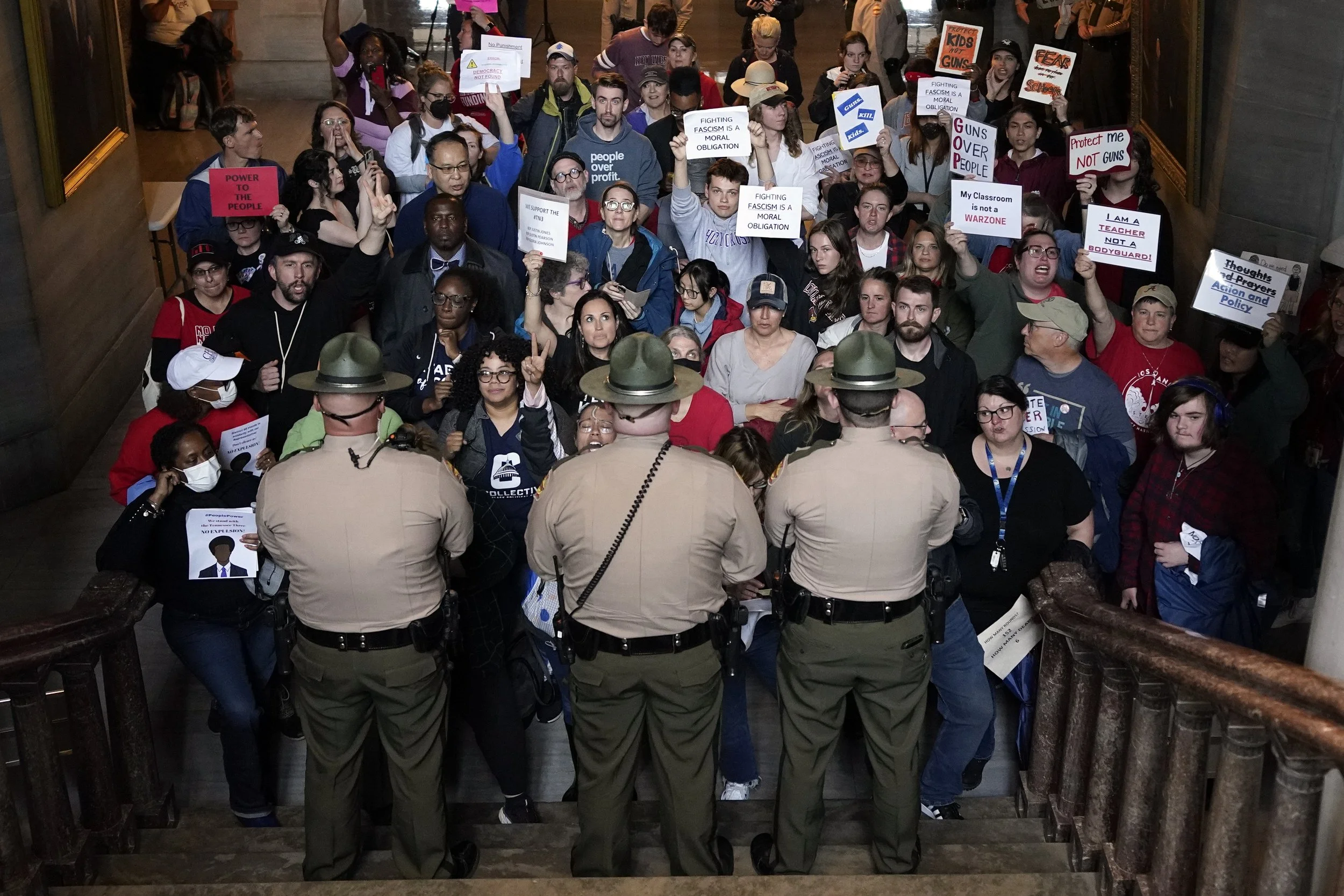  Tennessee state troopers block the stairwell leading to the legislative chambers at the Capitol in Nashville, Tenn., on April 6, 2023, as Tennessee Republicans considered whether to expell three House Democrats for using a bullhorn to shout support 