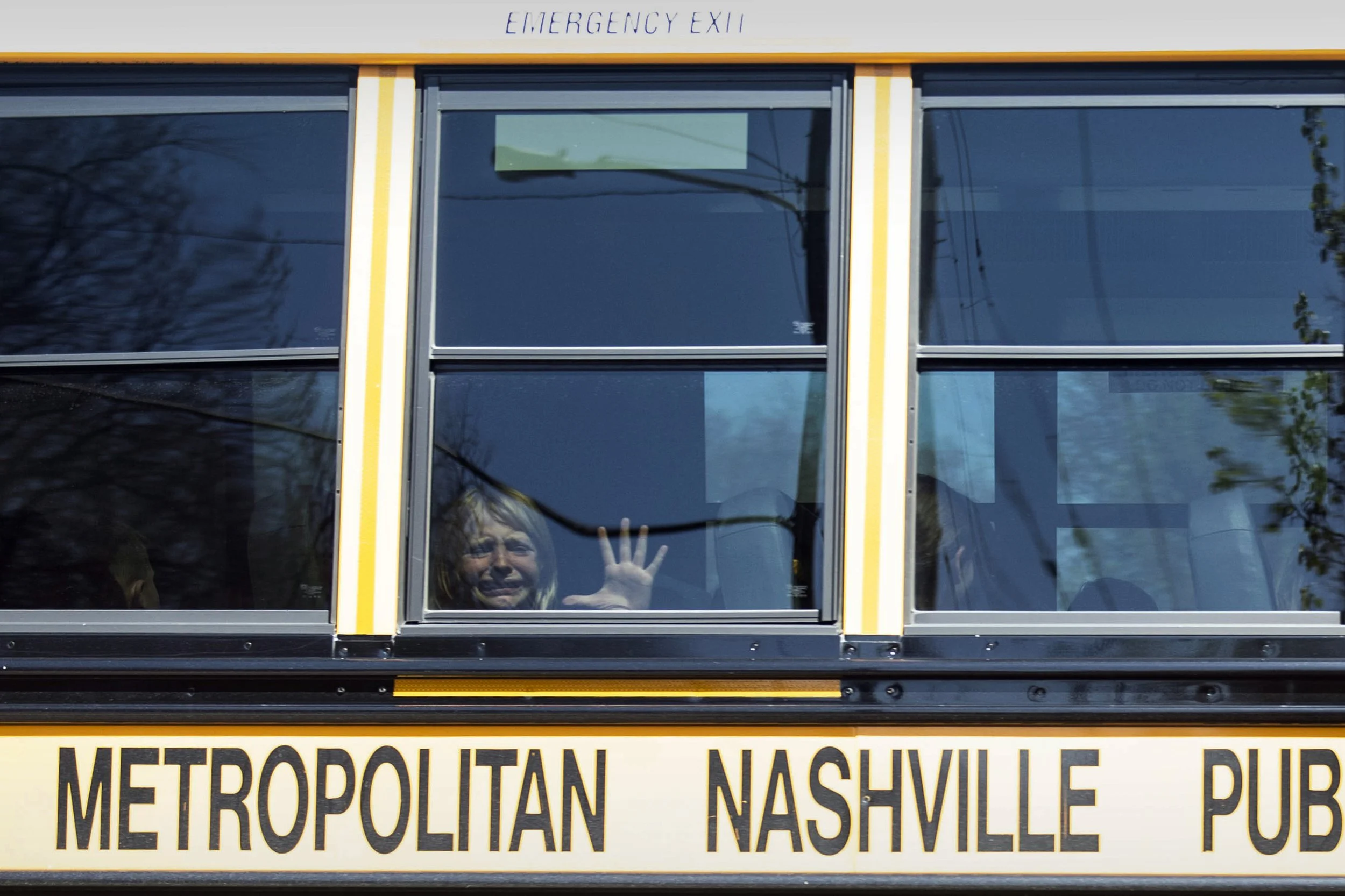  A child weeps on a bus leaving The Covenant School in Nashville, Tenn., following a mass shooting there on March 27, 2023. (Nicole Hester/The Tennessean via AP) 