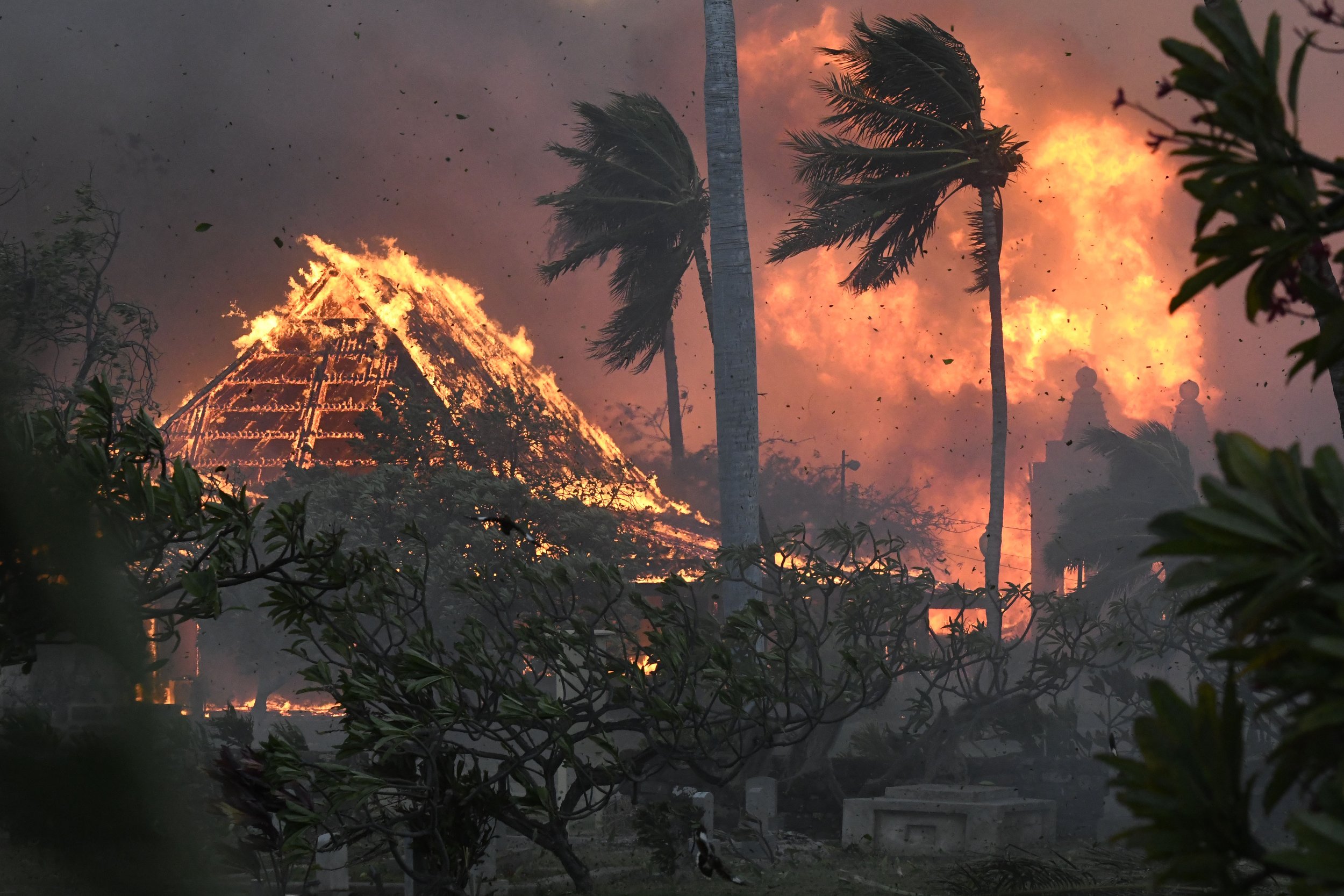  The hall of historic Waiola Church in Lahaina and nearby Lahaina Hongwanji Mission are engulfed in flames on Aug. 8, 2023, in Lahaina, Hawaii. (Matthew Thayer/The Maui News via AP) 