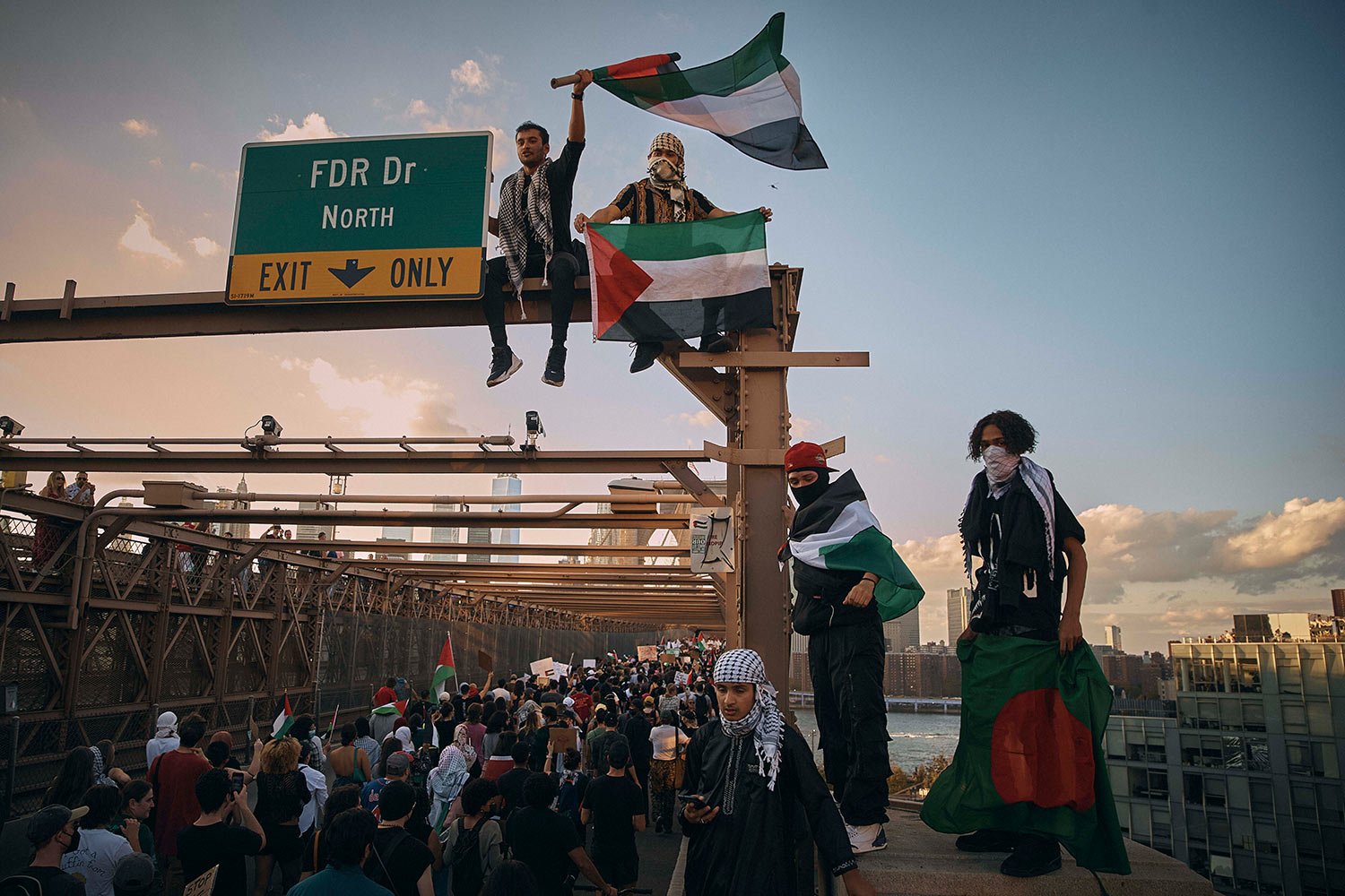  Protestors cross the Brooklyn Bridge in New York on Oct. 28, 2023, in a pro-Palestinian demonstration demanding a ceasefire between Israel and Hamas. (AP Photo/Andres Kudacki) 