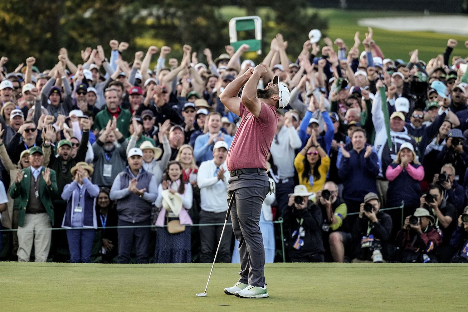 Jon Rahm, of Spain, celebrates on the 18th green after winning the Masters golf tournament at the Augusta National Golf Club, in Augusta, Ga., April 9, 2023. (AP Photo/Mark Baker) 