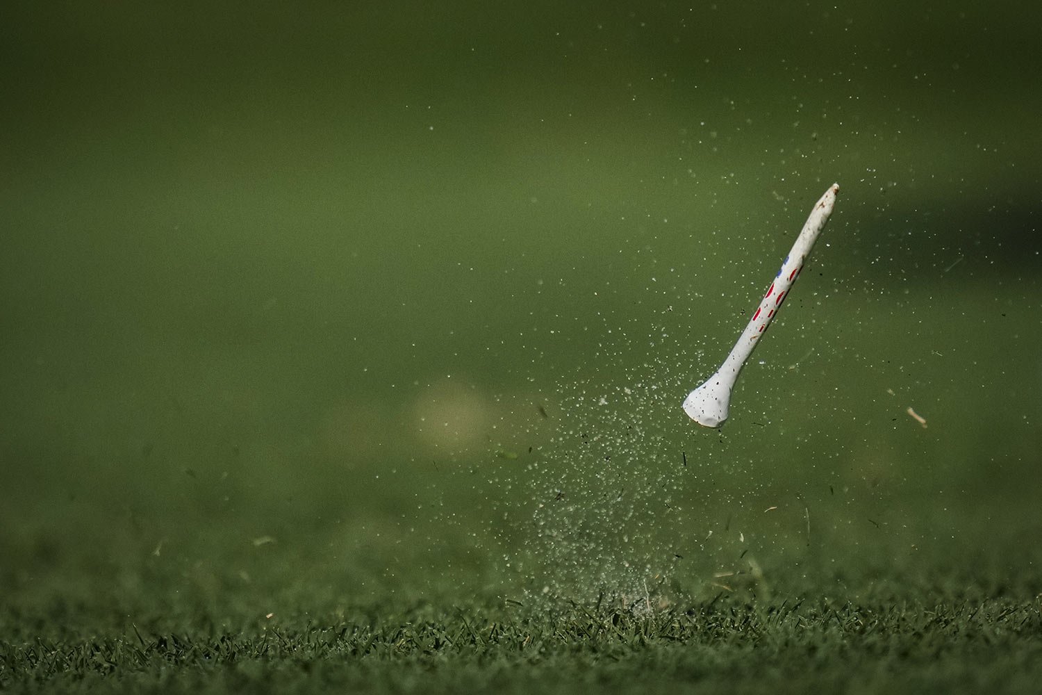  The wooden tee of United States' Cheyenne Knight bounces up after she plays her shot from the 9th tee during the afternoon fourball match at the Solheim Cup golf tournament in Finca Cortesin, near Casares, southern Spain, Sept. 23, 2023. (AP Photo/B