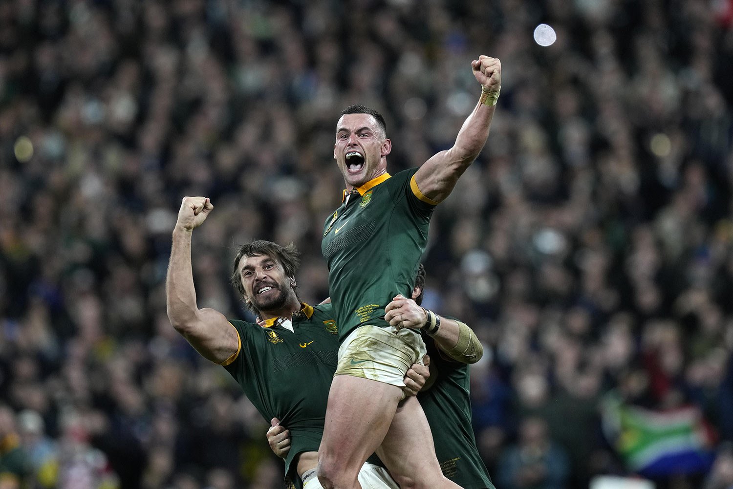  South Africa's Jesse Kriel, right, and teammate Eben Etzebeth celebrate their 12-11 victory over New Zealand, at the end of their Rugby World Cup final match, at the Stade de France in Saint-Denis, near Paris, Oct. 28, 2023. (AP Photo/Thibault Camus