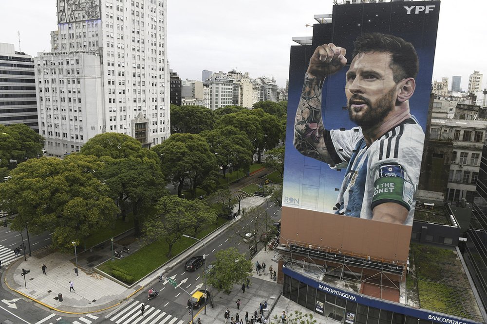  A mural of soccer player Lionel Messi is unveiled one year after his national Argentine team won the World Cup tournament in downtown Buenos Aires, Argentina, Dec. 18, 2023. (AP Photo/Gustavo Garello) 