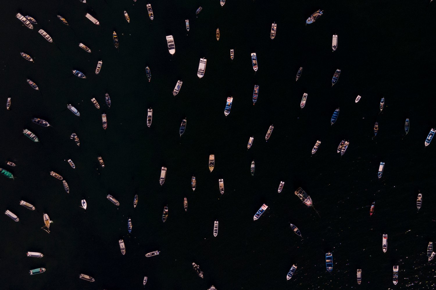  Boats float on the bay in Tongoy, Chile, Jan. 22, 2024. (AP Photo/Matias Basualdo) 