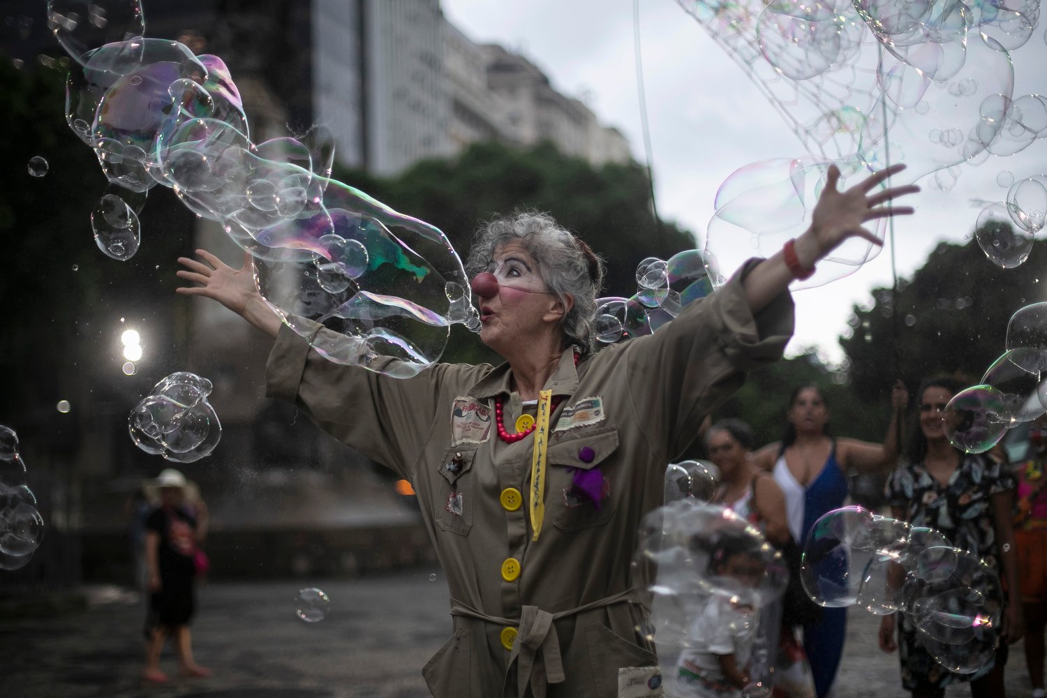  An artist dressed as a clown performs during a protest against the death of Venezuelan artist Julieta Hernández and violence against women, in Rio de Janeiro, Brazil, Jan. 12, 2024. The body of Hernández, who had been missing since Dec. 23 while tra