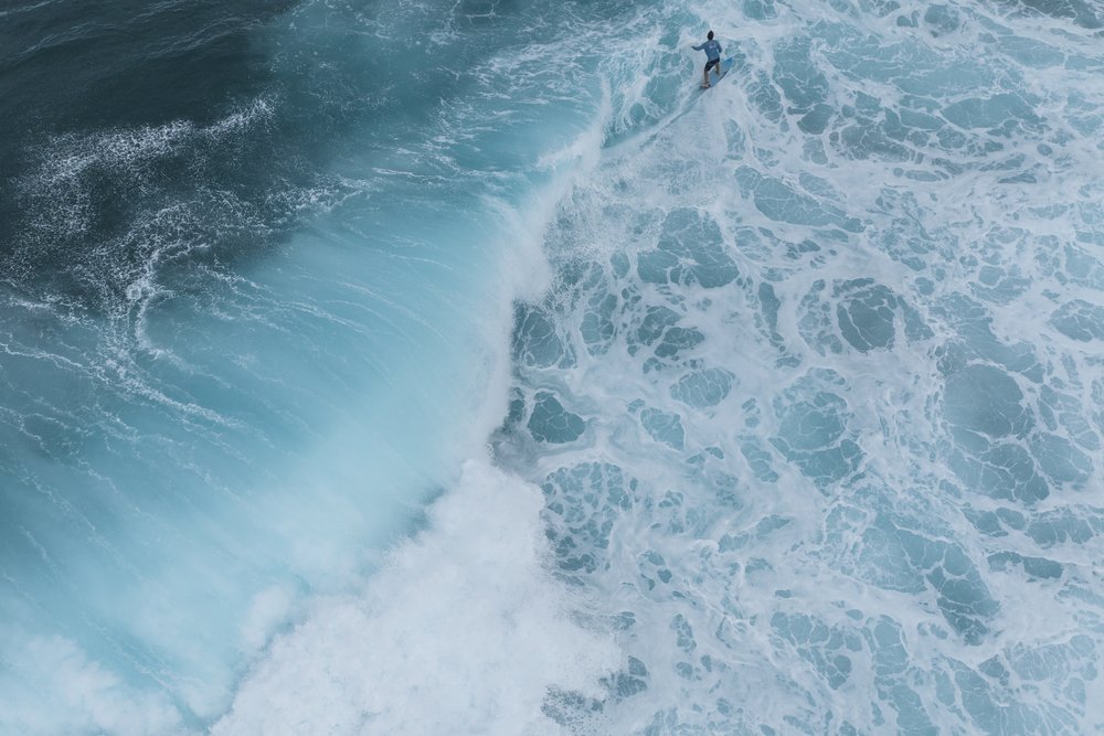  A surfer rides a wave in Teahupo'o, Tahiti, French Polynesia, Saturday, Jan. 13, 2024.  (AP Photo/Daniel Cole)    