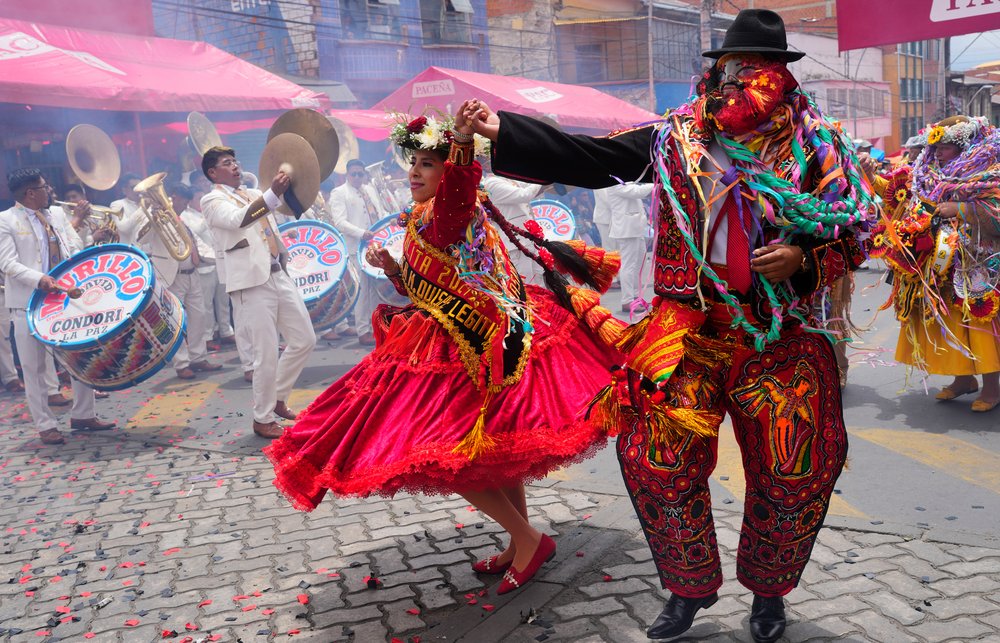  Revelers dance on the closing day of Carnival in La Paz, Bolivia, Sunday, Feb. 18, 2024. (AP Photo/Juan Karita) 
