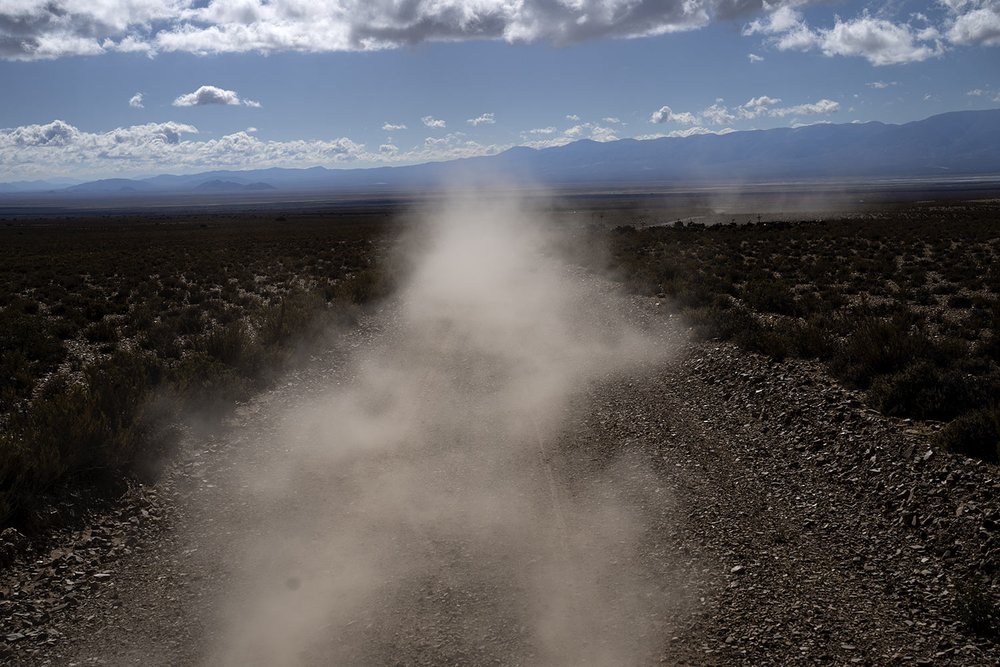  Dust is kicked up from the road as the Callata family drives to the site where they raise livestock in Tusaquillas, Jujuy Province, Argentina, April 23, 2023. (AP Photo/Rodrigo Abd) 
