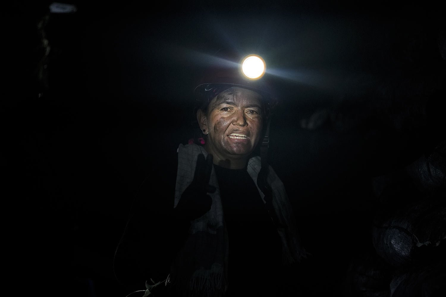  Emerald miner Janeth Paez stands inside the tunnel of an informal mine near the town of Coscuez, Colombia, Feb. 28, 2024. (AP Photo/Fernando Vergara) 
