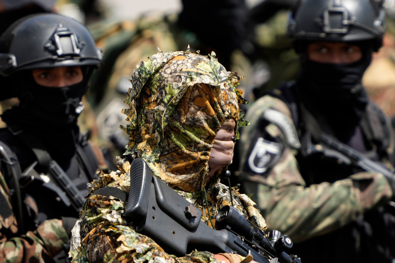  Special Forces Army soldiers march during a military parade marking Army Day in Brasilia, Brazil, April 19, 2024. (AP Photo/Eraldo Peres) 