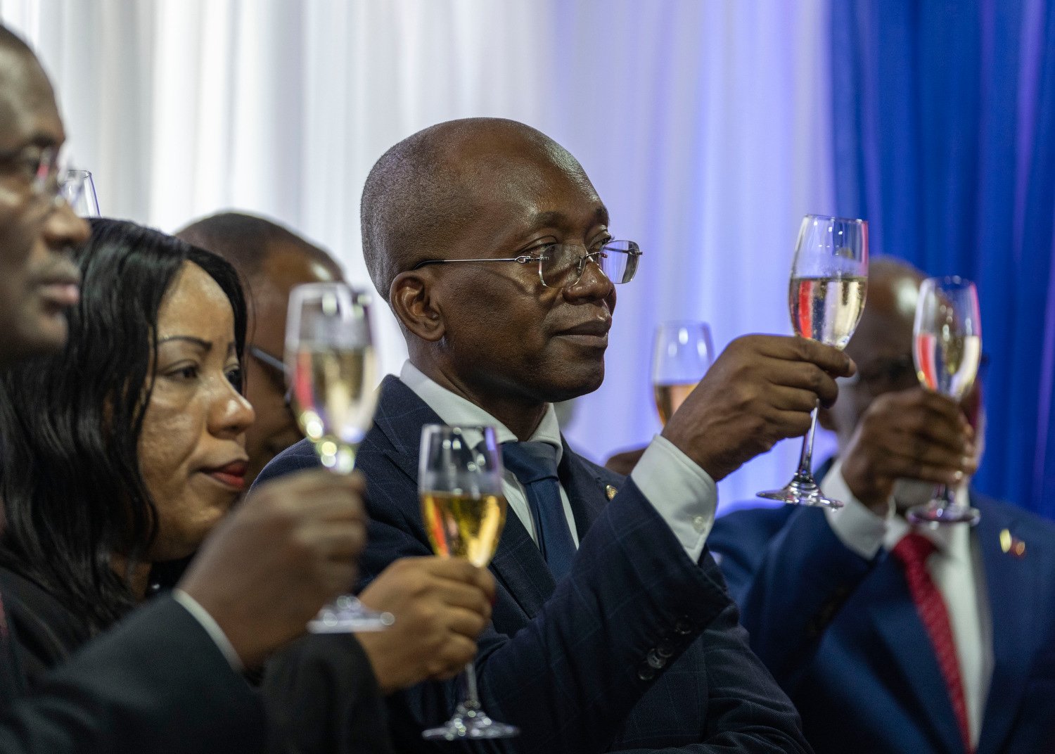  Michel Patrick Boisvert, who was named interim prime minister, toasts during the swearing-in ceremony of the transitional council that is tasked with selecting a new prime minister and cabinet in Port-au-Prince, Haiti, April 25, 2024. (AP Photo/Ramo