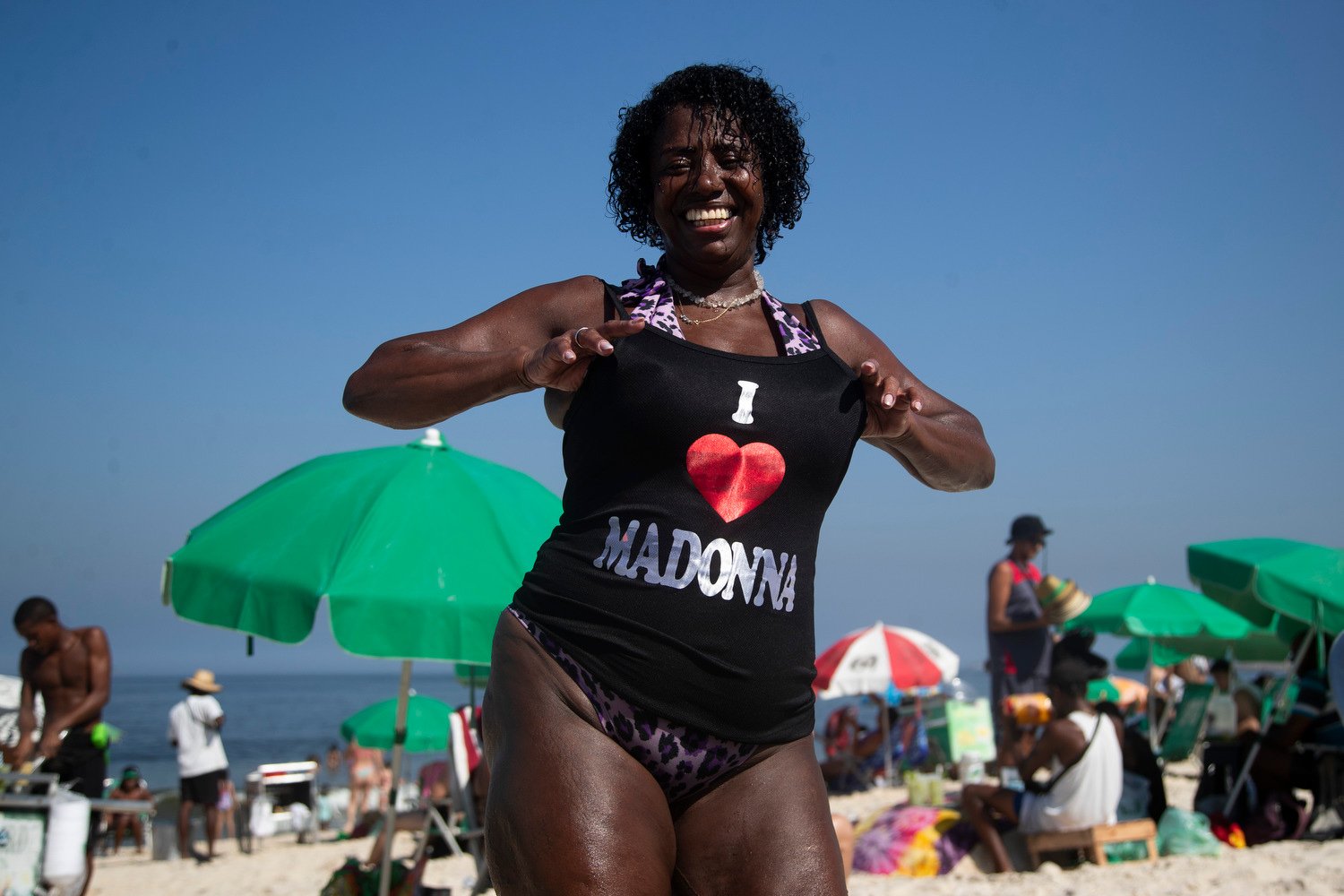  Beachgoer Elizabeth Goncalves shows off her newly bought Madonna T-shirt ahead of the pop star’s free concert on Copacabana beach in Rio de Janeiro, Brazil, April 29, 2024. (AP Photo/Bruna Prado) 