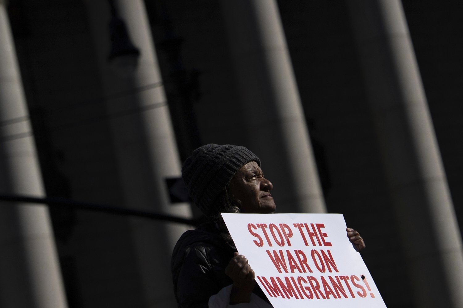 A demonstrator holds a sign during a protest in Foley Square on the Day of Action for Higher Education, Thursday, April 17, 2025, in New York. (AP Photo/Julia Demaree Nikhinson)