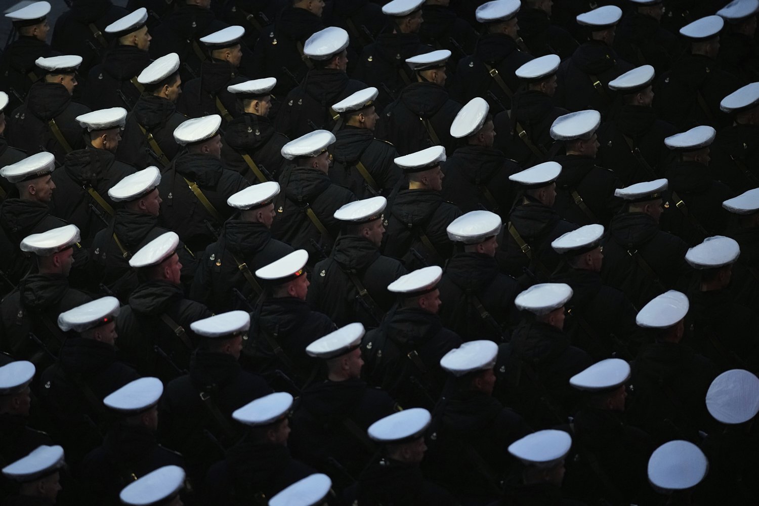 Russian servicemen march towards the Red Square prior to the Victory Day military parade rehearsal in Moscow, Russia, Saturday, May 3, 2025. (AP Photo/Pavel Bednyakov)