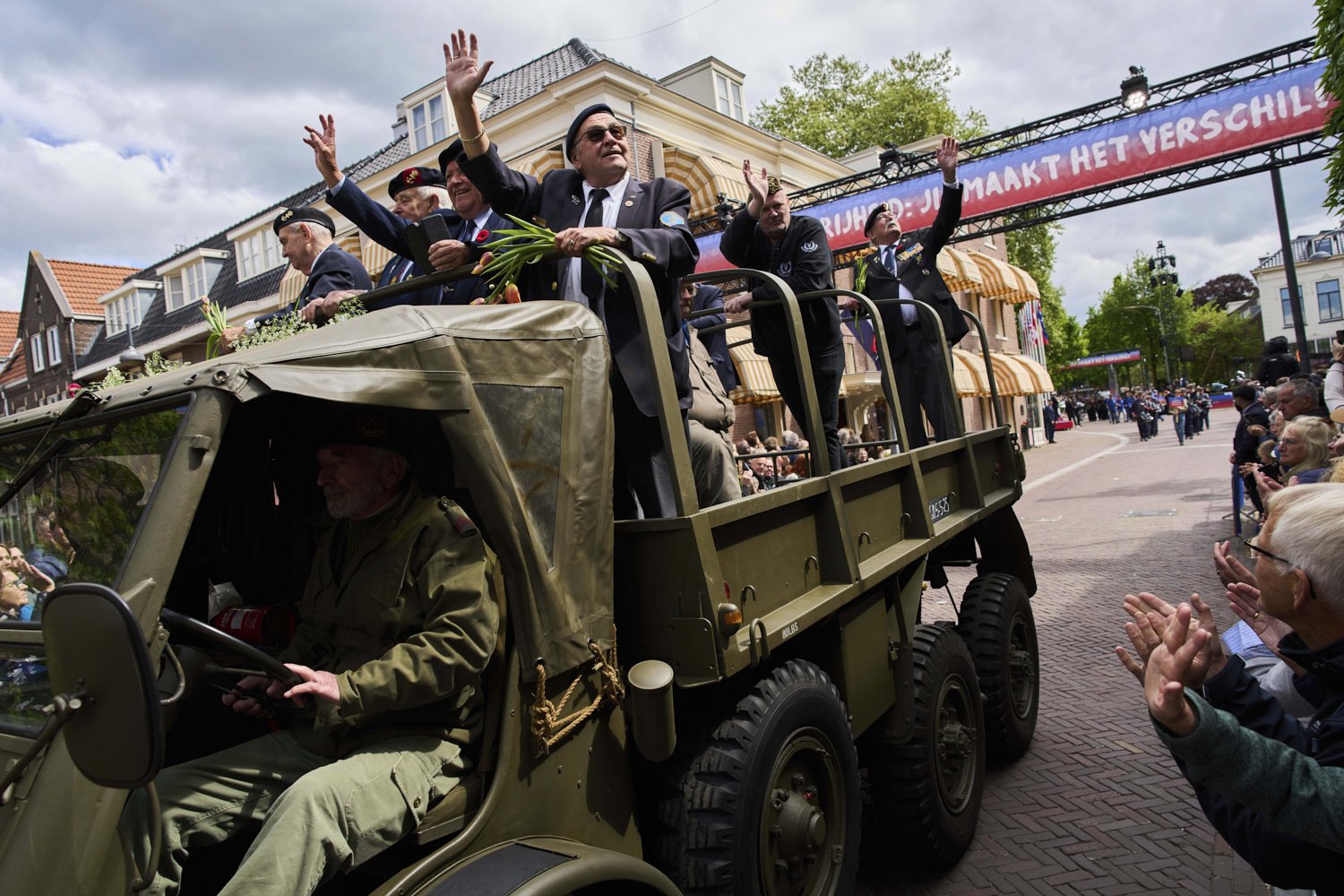 World War II veterans take part in a parade to mark Liberation Day in Wageningen, Netherlands, Monday, May 5, 2025. (AP Photo/Peter Dejong)