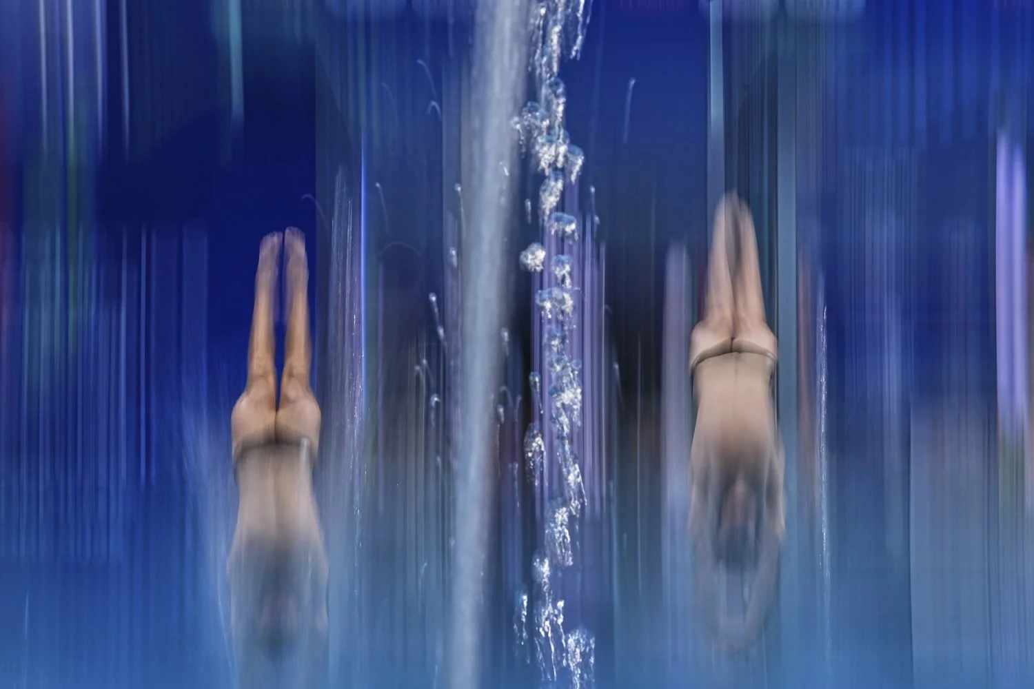 Tazman Abramowicz and Carson Paul of Canada compete in the men's 3m synchronised preliminaries at the World Aquatics Championships in Singapore, Monday, July 28, 2025. (AP Photo/Ng Han Guan)