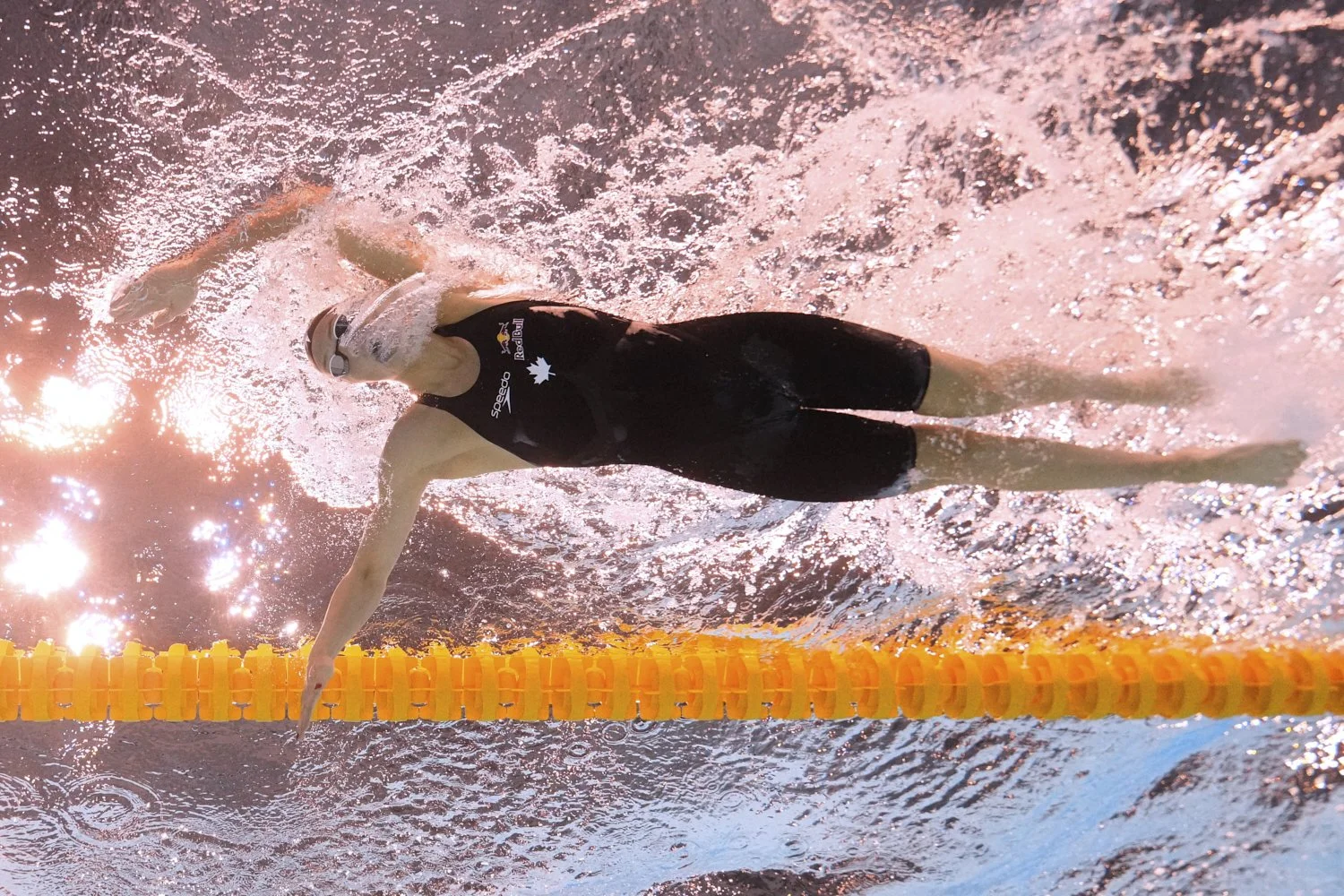 Summer McIntosh of Canada competes in the women's 400-meter freestyle heat at the World Aquatics Championships in Singapore, Sunday, July 27, 2025. (AP Photo/Lee Jin-man)