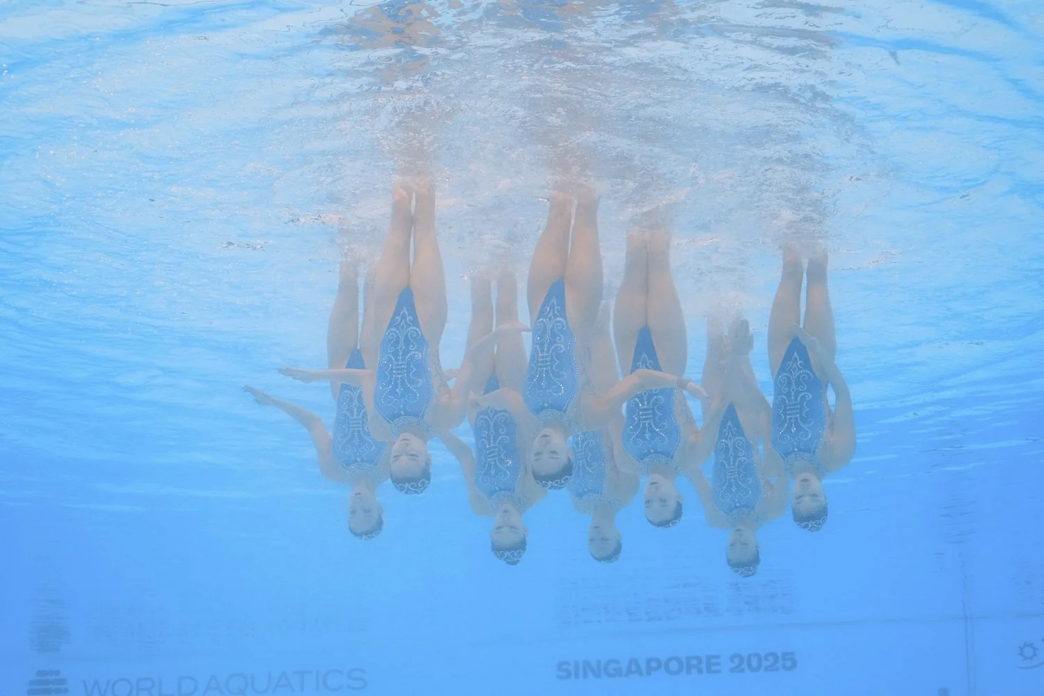 Team China compete in the team free preliminary of artistic swimming at the World Aquatics Championships in Singapore, Saturday, July 19, 2025. (AP Photo/Lee Jin-man)