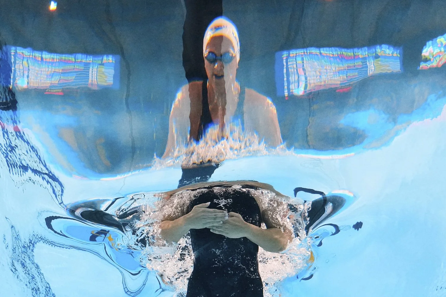 Palestinian swimmer Marina Abu Shamaleh competes in the women's 100-meter breaststroke heat at the World Aquatics Championships in Singapore, Monday, July 28, 2025. (AP Photo/Lee Jin-man)