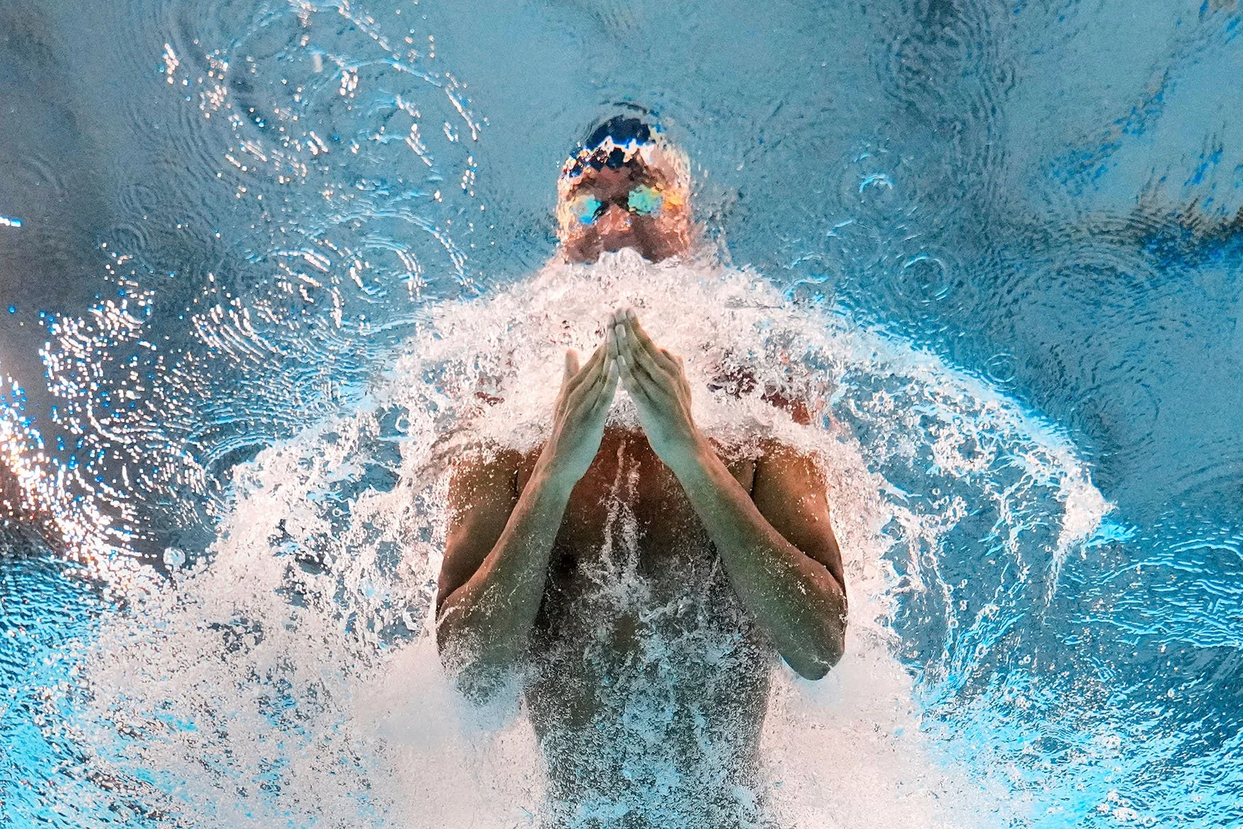 Above and below: AP photographers cover all angles at the World Aquatics