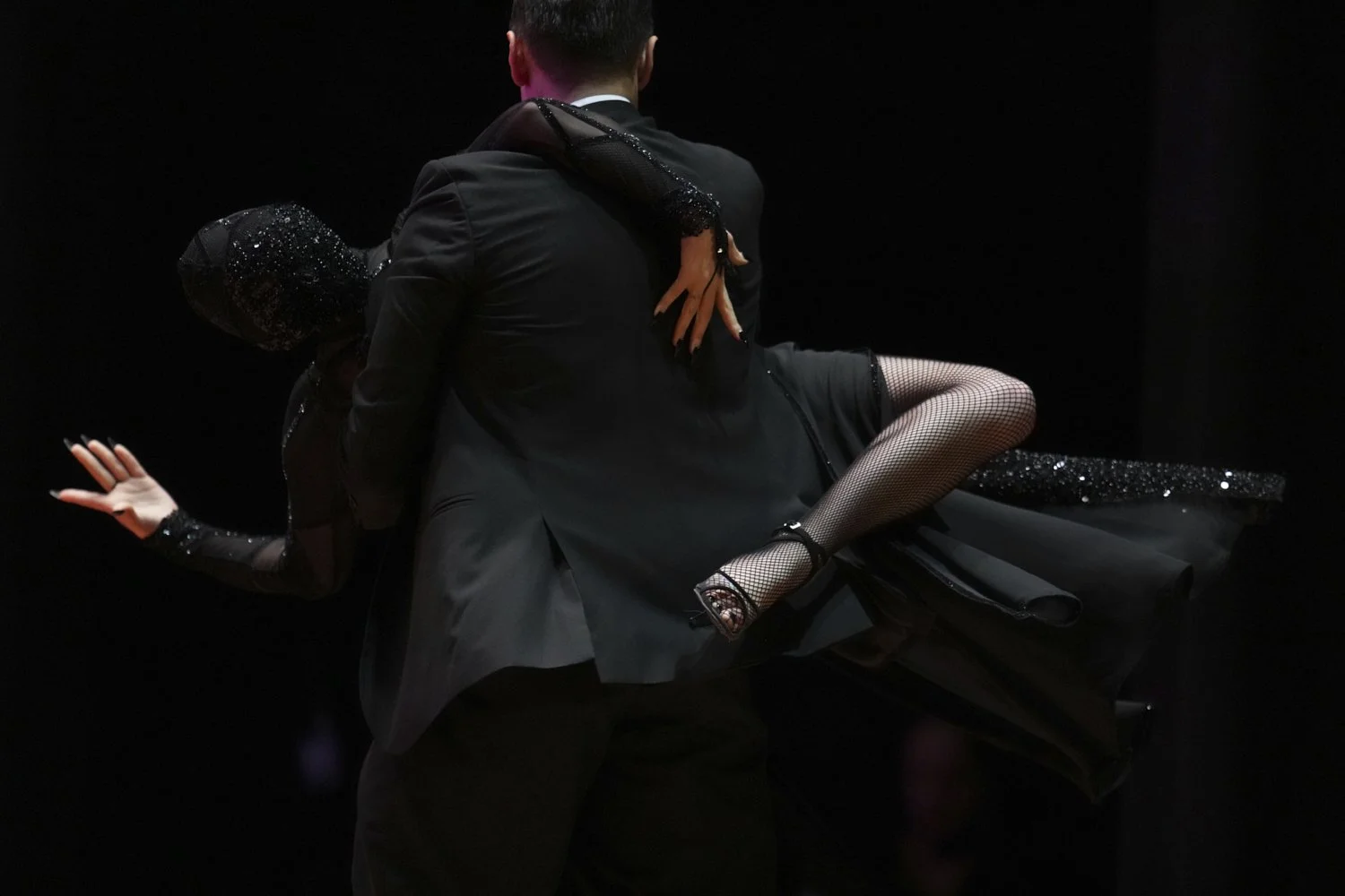Leandro Bojko and Micaela Garcia compete in the stage category finals of the World Tango Championship, in Buenos Aires, Argentina, Tuesday, Sept. 2, 2025. (AP Photo/Natacha Pisarenko)
