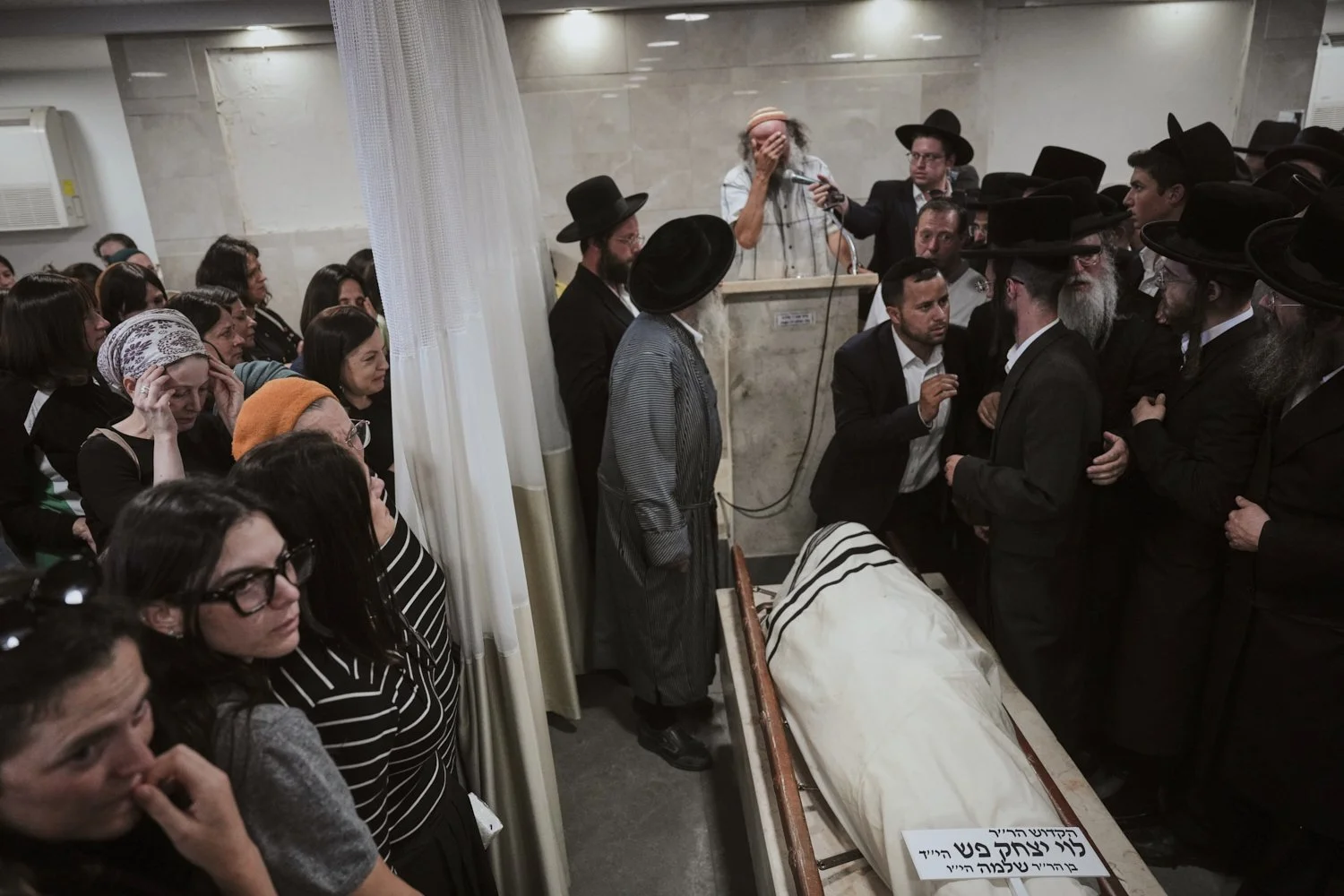 Mourners attend the funeral of Levi Yitzhak Pash, who was killed along with five other Israelis in a shooting attack by two Palestinian gunmen at a bus stop in Jerusalem Monday, Sept. 8, 2025. (AP Photo/Ariel Schalit)