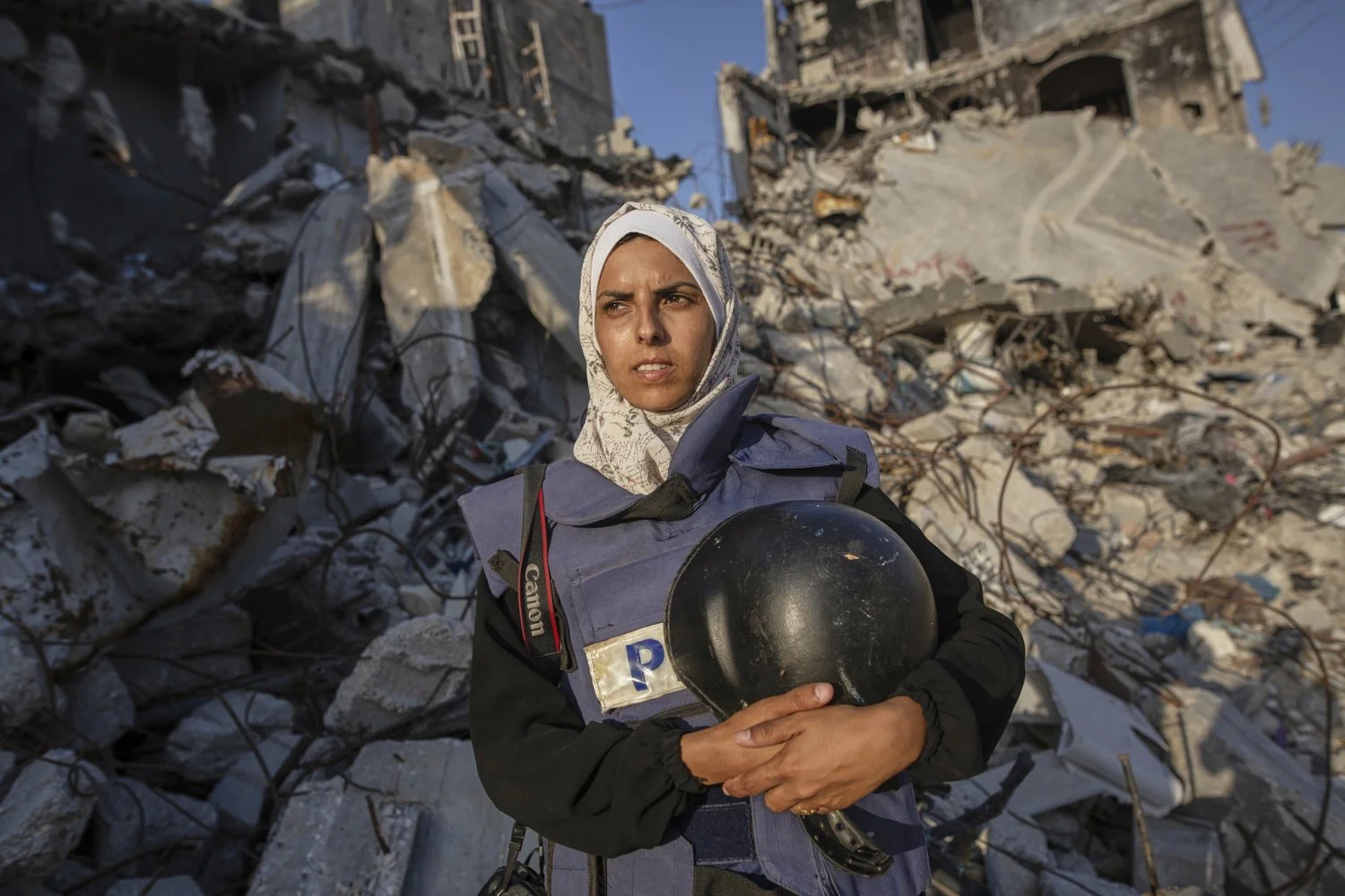Freelance journalist Mariam Dagga, 33, who had been working with the Associated Press and other outlets during the Gaza war, poses for a portrait in Khan Younis, southern Gaza Strip, on June 14, 2024. Dagga was one of several journalists killed alon