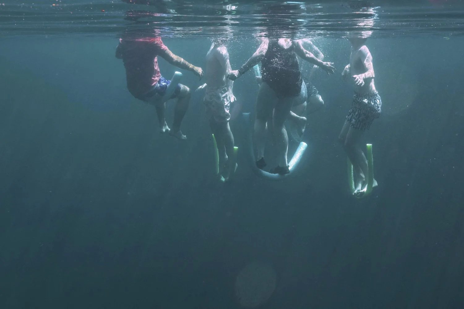 A family swims in Royal Spring, in Suwanne County, Florida, July 15, 2025. (AP Photo/Marta Lavandier)