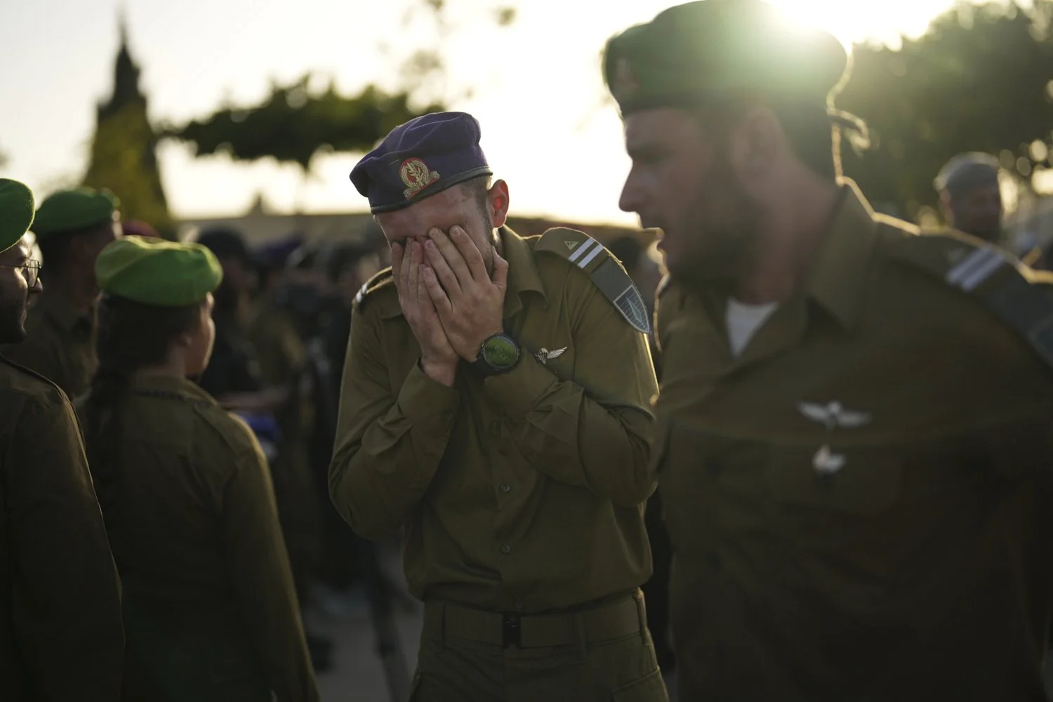  Israeli soldiers mourn during the funeral of comrade Staff Sergeant Itay Yavetz, killed in Gaza, in Modiin, Israel, Oct. 20, 2025. (AP Photo/Francisco Seco) 