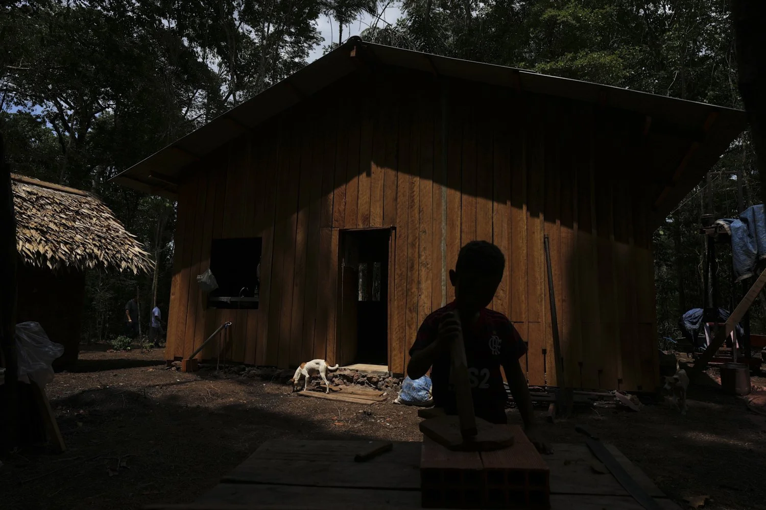  Riquelme plays in the backyard of his home at a quilombola, an Afro-descendant community called Menino Jesus, in Acara, Brazil, Tuesday, Nov. 18, 2025. (AP Photo/Fernando Llano) 
