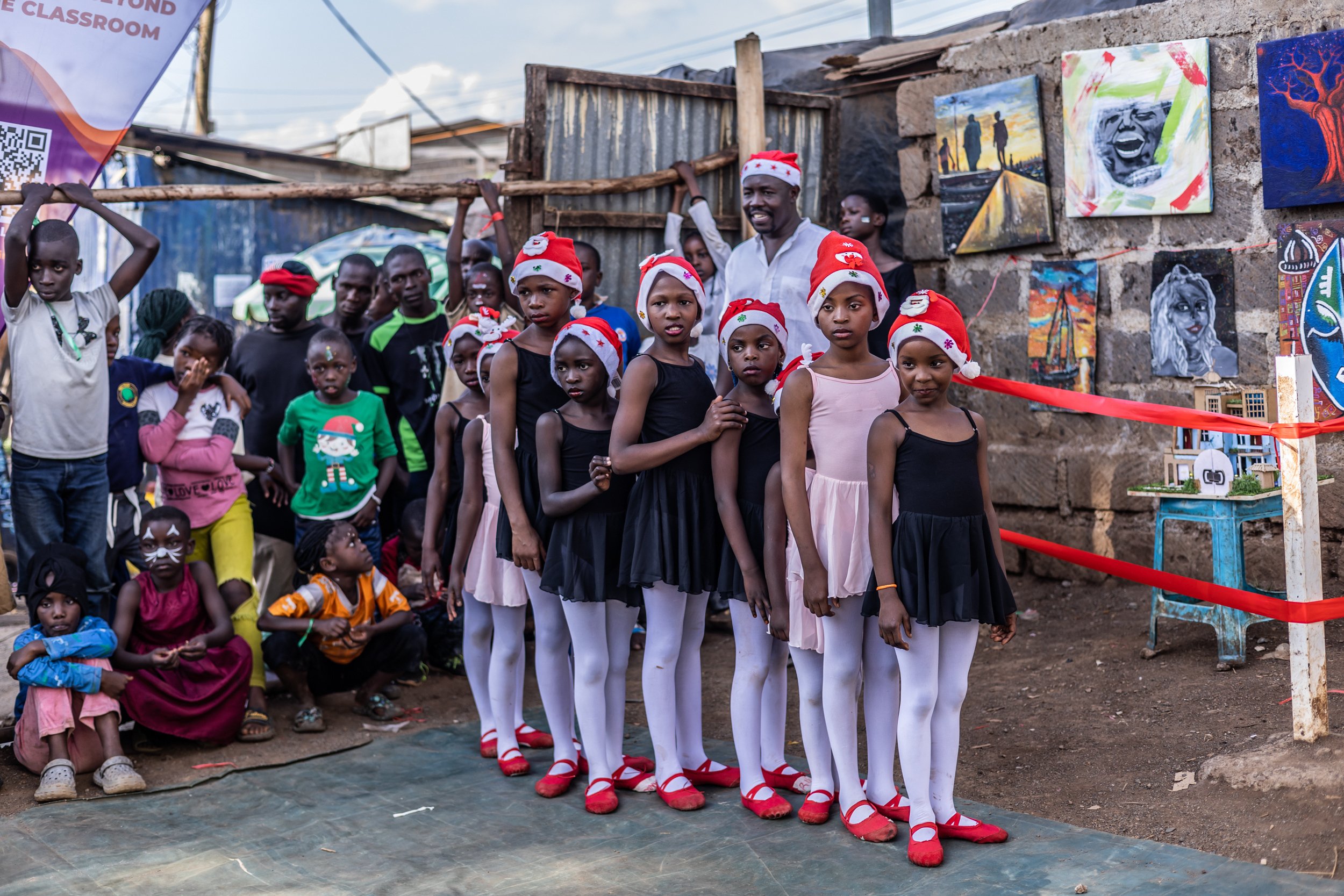  Young dancers wait to perform at a Christmas ballet event in Nairobi, Dec. 23, 2025. (AP Photo/Samson Otieno) 