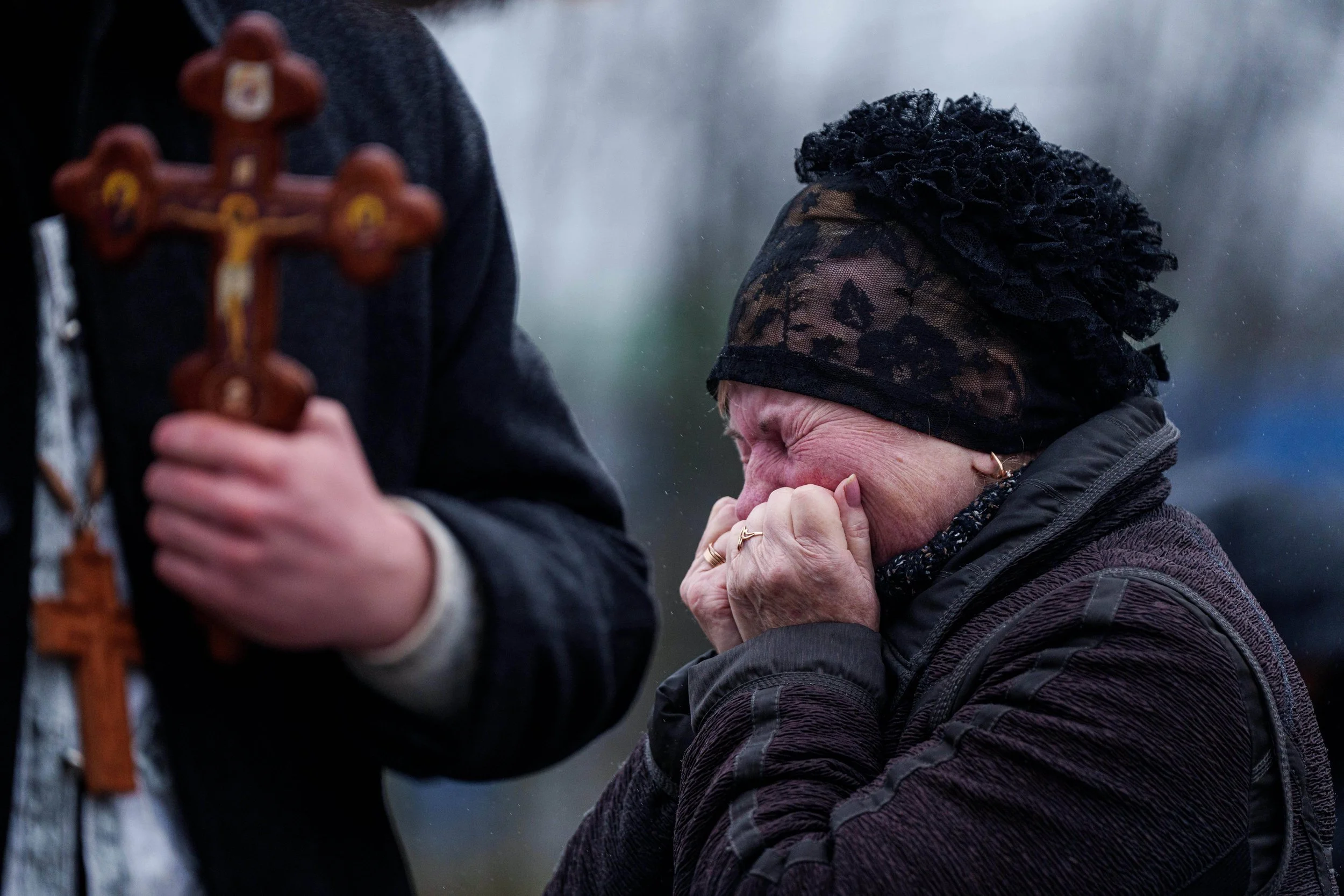  A mother cries by the coffin of her son Oleh Borovyk, a Ukrainian serviceman who was killed in fighting with Russian forces near Pokrovsk, during his funeral in Boiarka, Ukraine, Dec. 3, 2025. (AP Photo/Evgeniy Maloletka) 