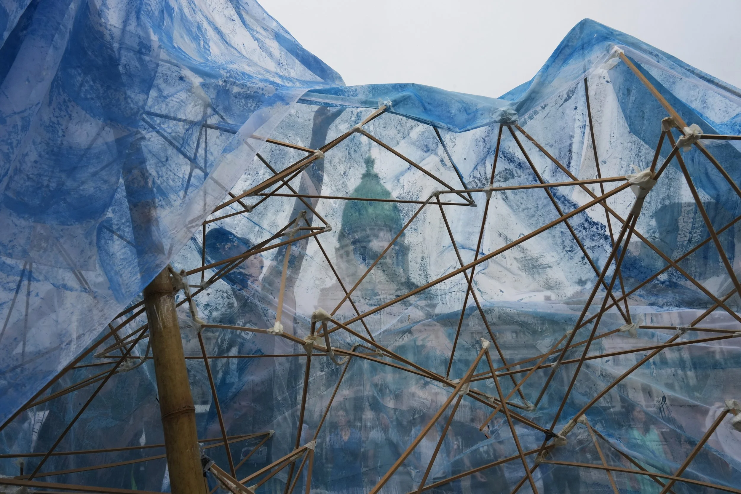  Environmentalists create a glacier-shaped structure outside Congress in Buenos Aires, Argentina, to protest a bill that would ease environmental protections, Dec. 22, 2025. (AP Photo/Rodrigo Abd) 
