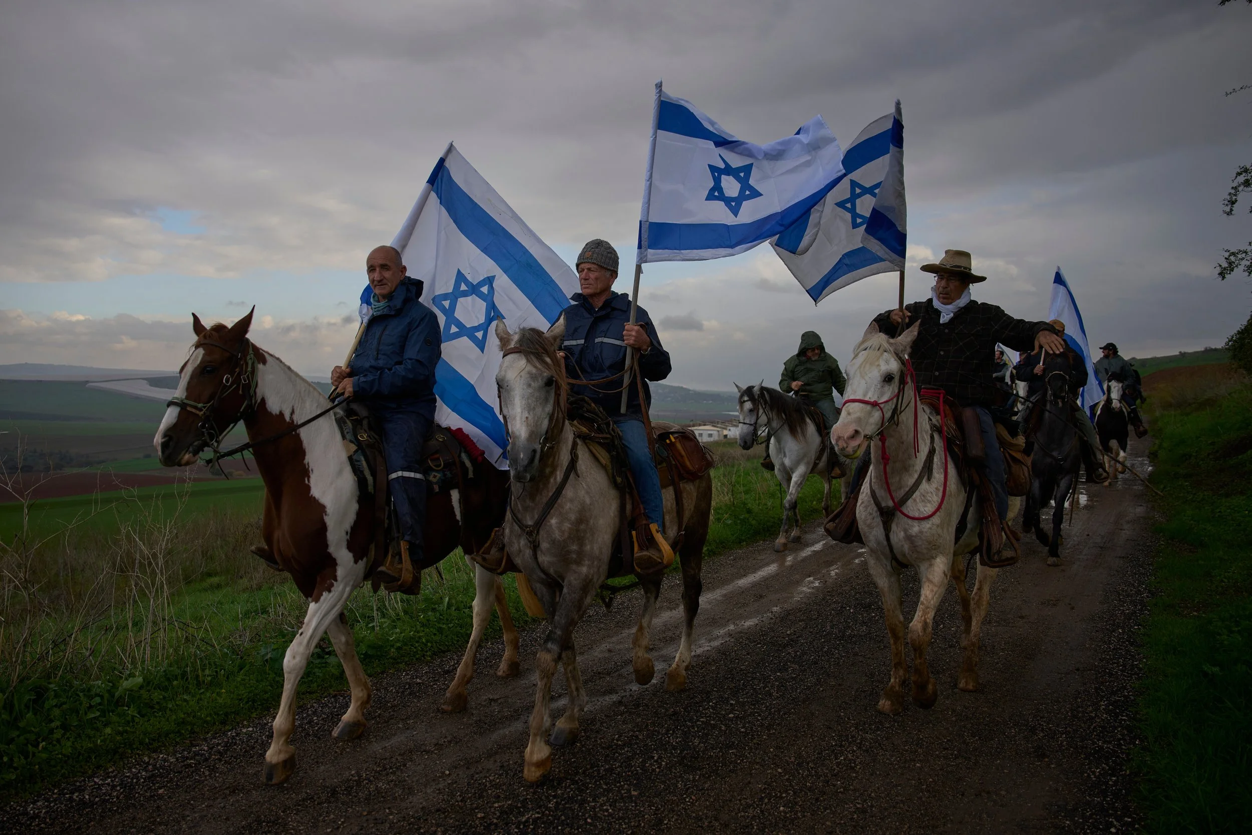  Israelis ride on horseback for the funeral procession of Aviv Maor, an 18-year-old Israeli who was killed by a Palestinian attacker the previous week, at Kibbutz Ein Harod cemetery in northern Israel, Dec. 29, 2025. (AP Photo/Ohad Zwigenberg) 