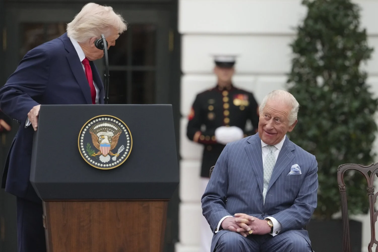  Britain's King Charles III listens as President Donald Trump speaks during a State Visit arrival ceremony on the South Lawn of the White House in Washington, April 28, 2026, in Washington. (AP Photo/Alex Brandon) 
