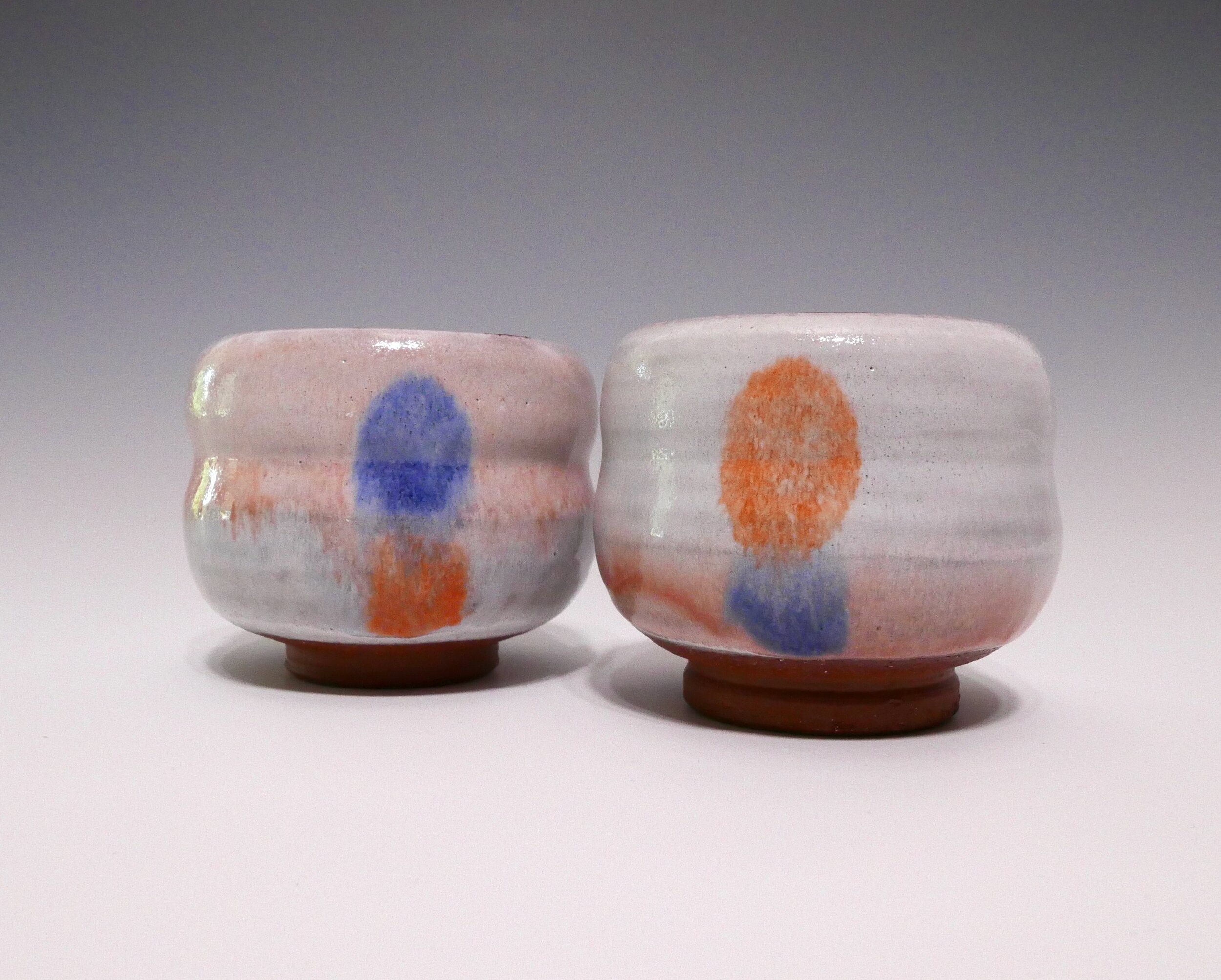 Sun and Moon Majolica Meoto Chawan Set, glazed terra cotta, approximately 3.25 x 3.5 x 3.5 inches each