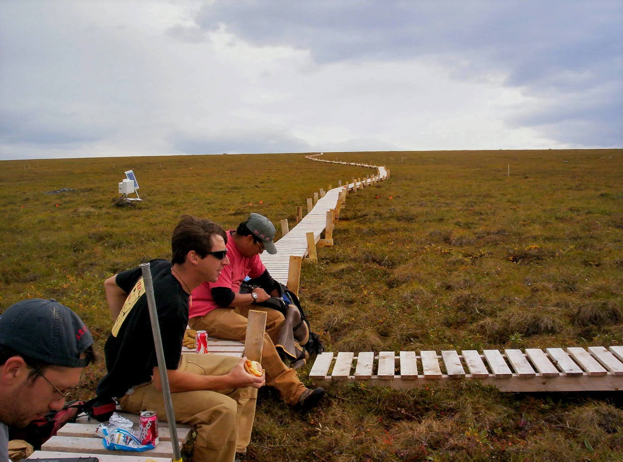 Installing an elevated boardwalk near Inuviat Creek in Eastern Alaska so scientists could conduct their research on the tundra without stepping on it.