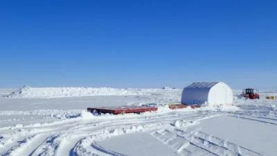 On the horizon, the pile of snow moved to dislodge the sled and tractor. Impressive! Photo: Robin Davies